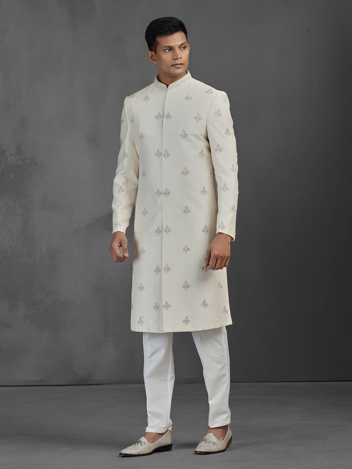 Cream silk wedding sherwani with butti work