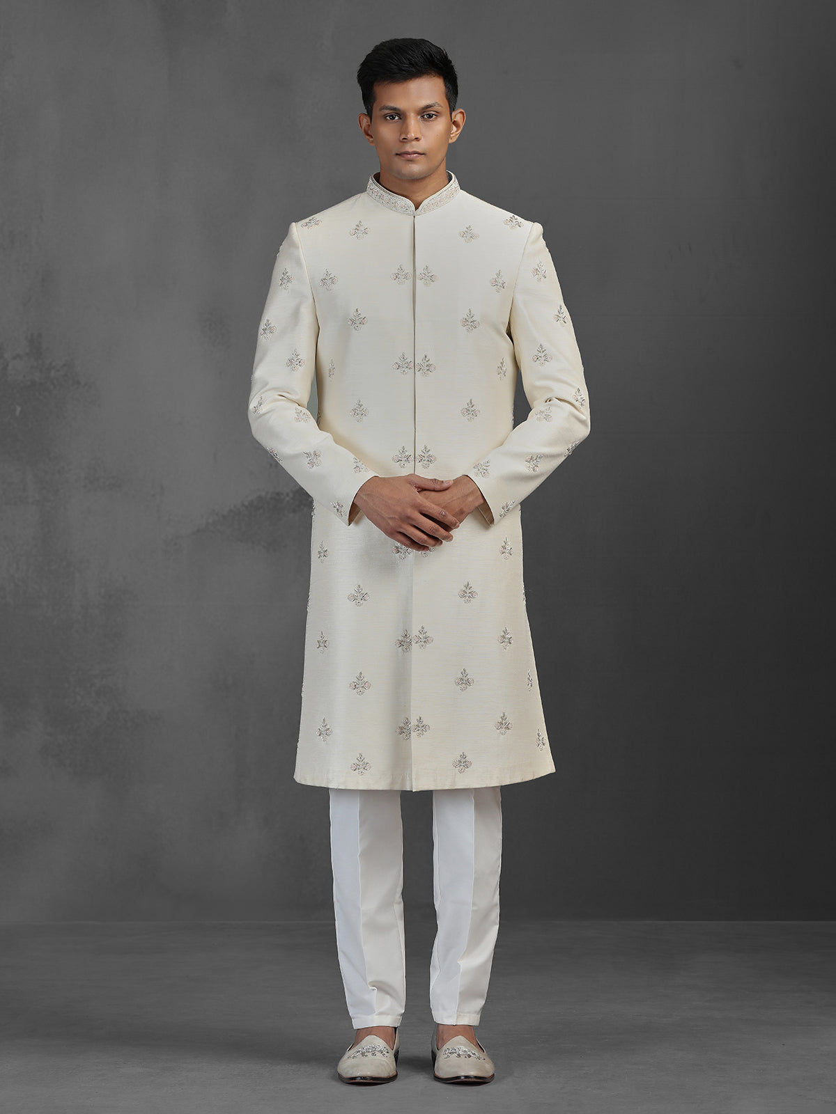 Cream silk wedding sherwani with butti work