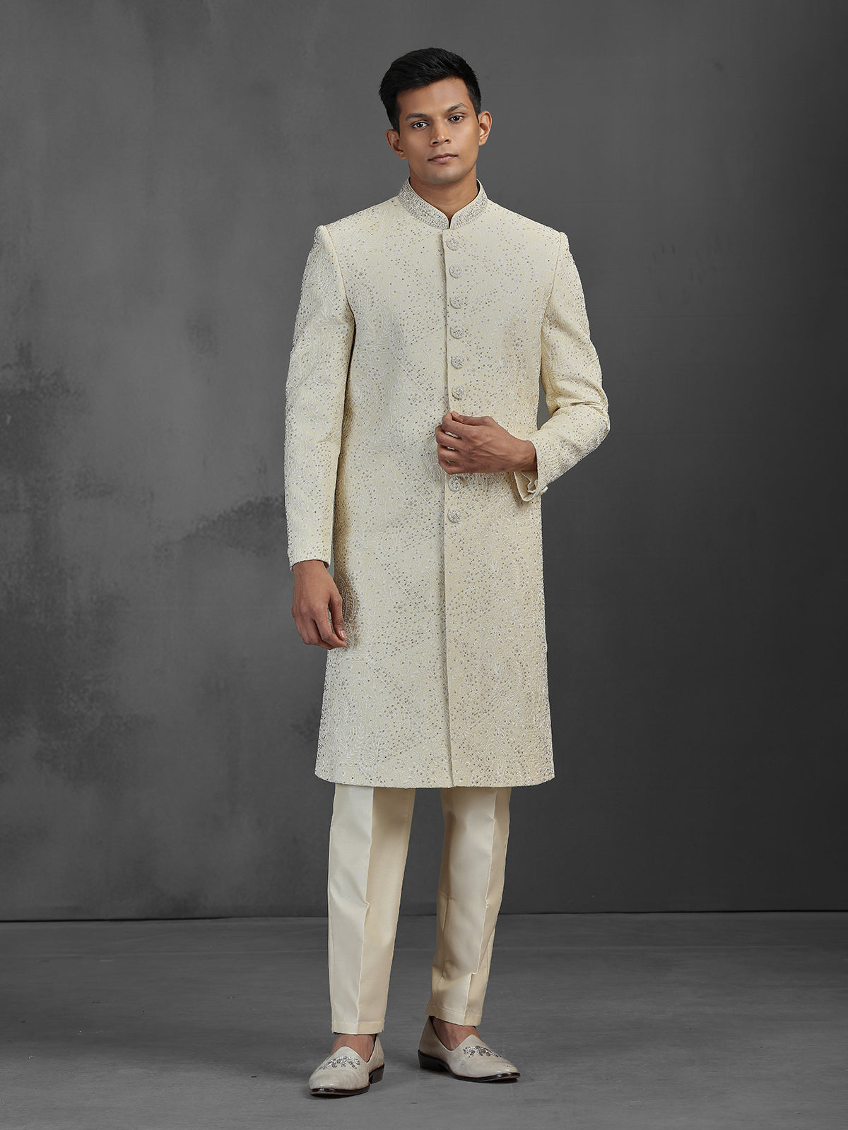 Cream silk wedding sherwani with embroidery