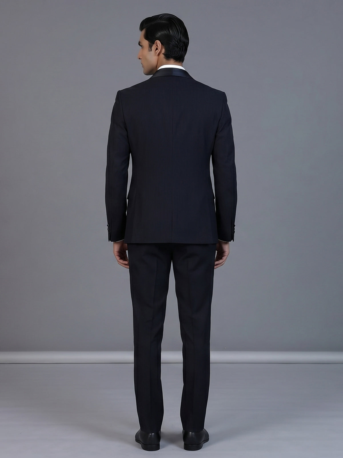 Navy blue designer double breasted suit with satin peak lapel finish