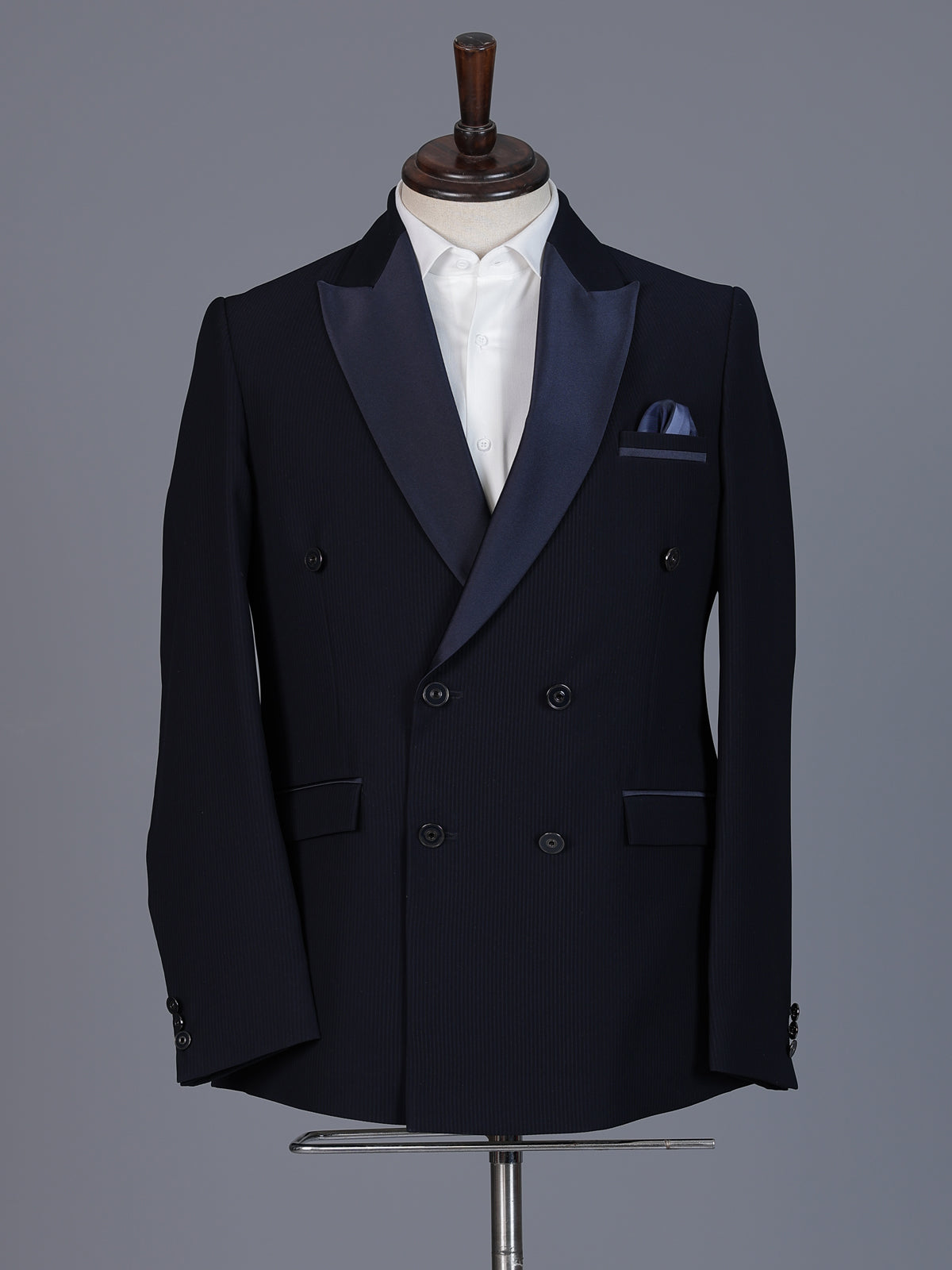 Navy blue designer double breasted suit with satin peak lapel finish