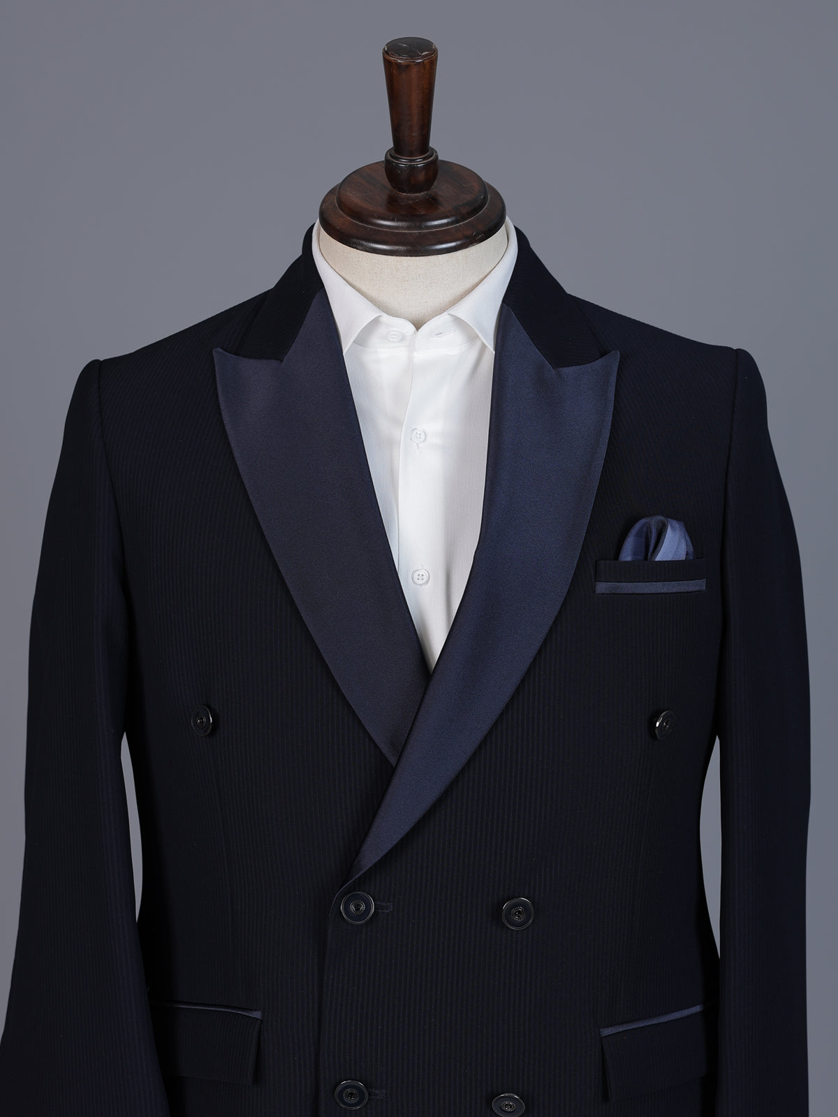 Navy blue designer double breasted suit with satin peak lapel finish