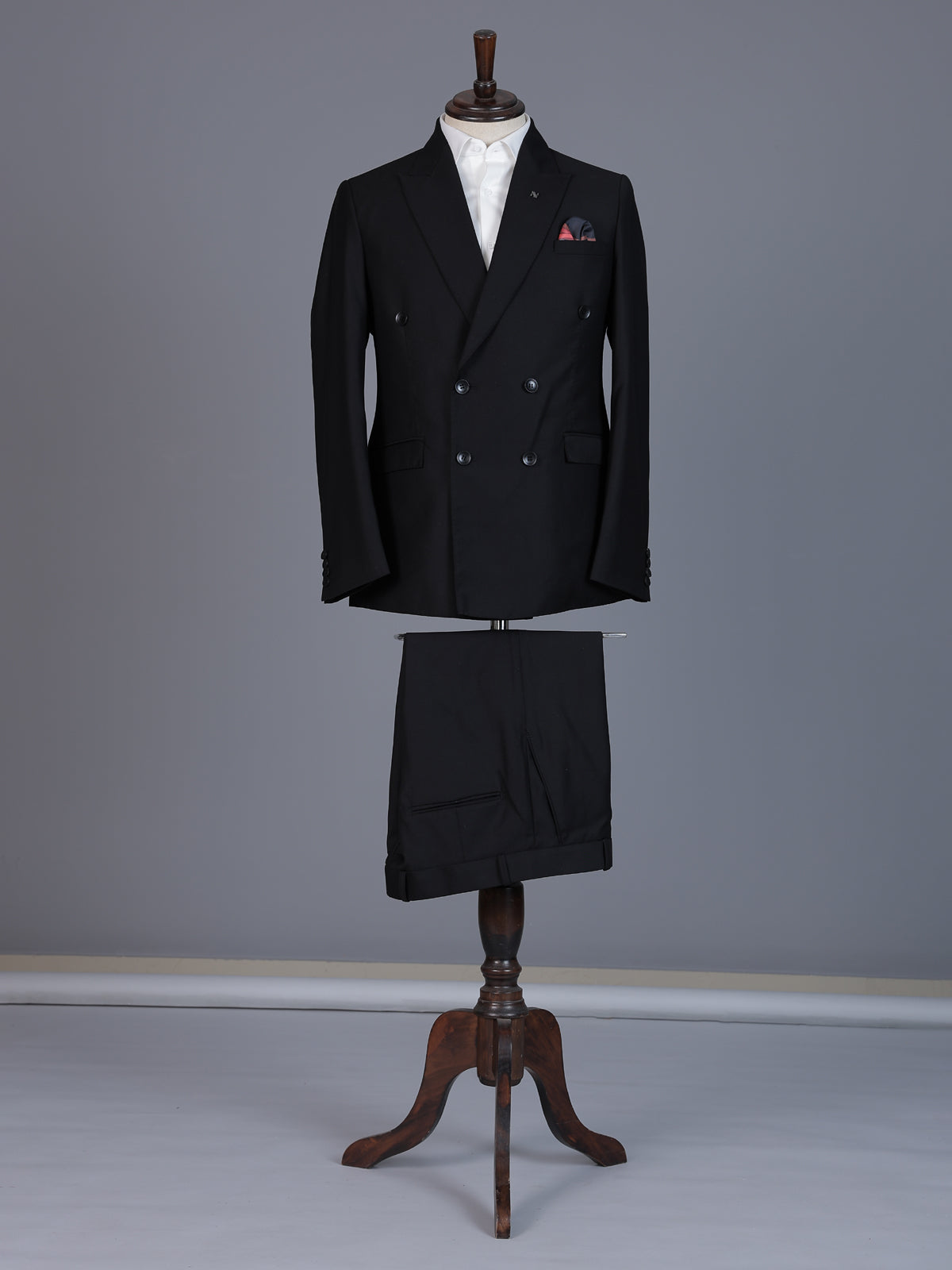 Classic black formal double breasted suit with bold peak lapel