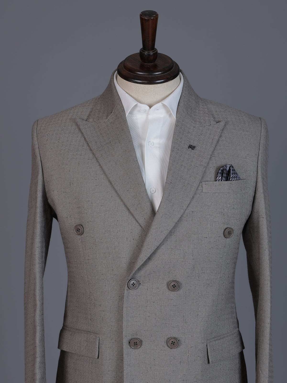 Taupe designer double breasted suit with textured birdseye peak lapel