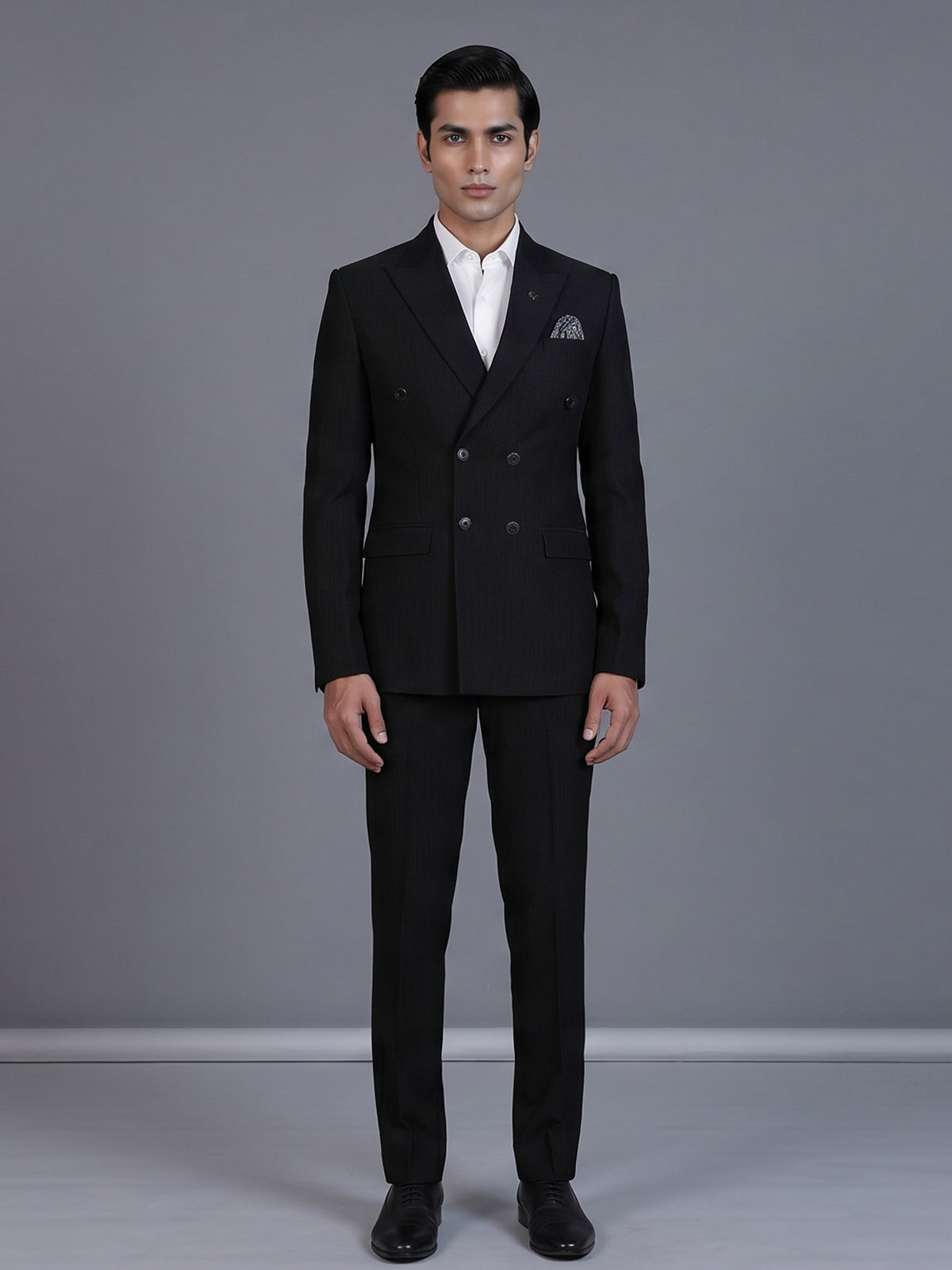 Black pinstripe formal double breasted suit with wide peak lapel