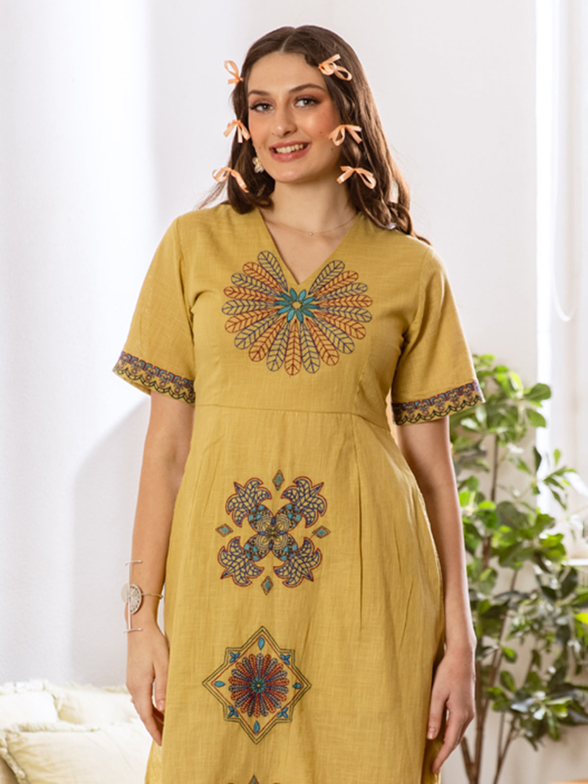 Dusty yellow cotton linen kurti with elegant embroidery