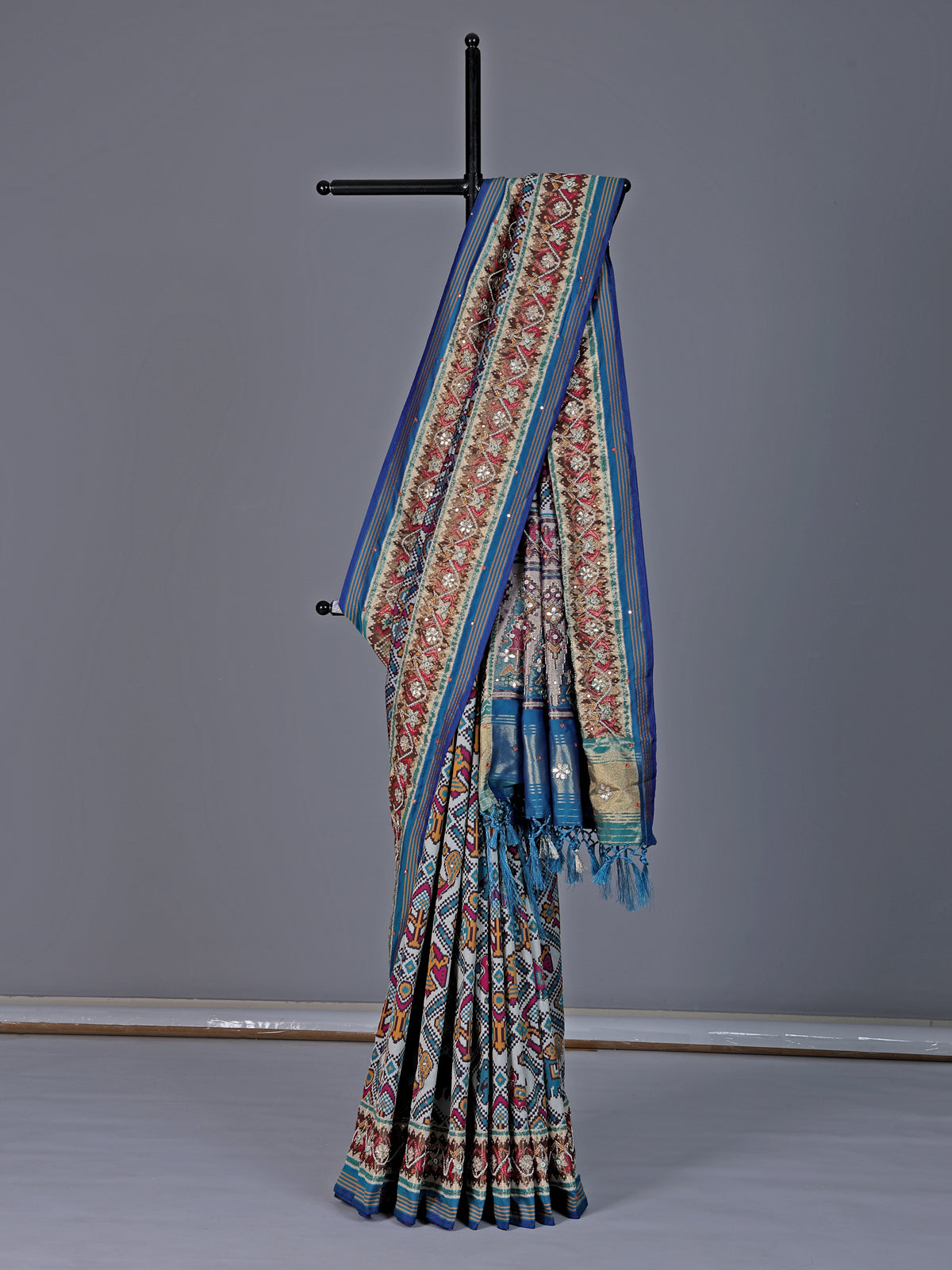 Blue semi patola silk saree with rich embellishments