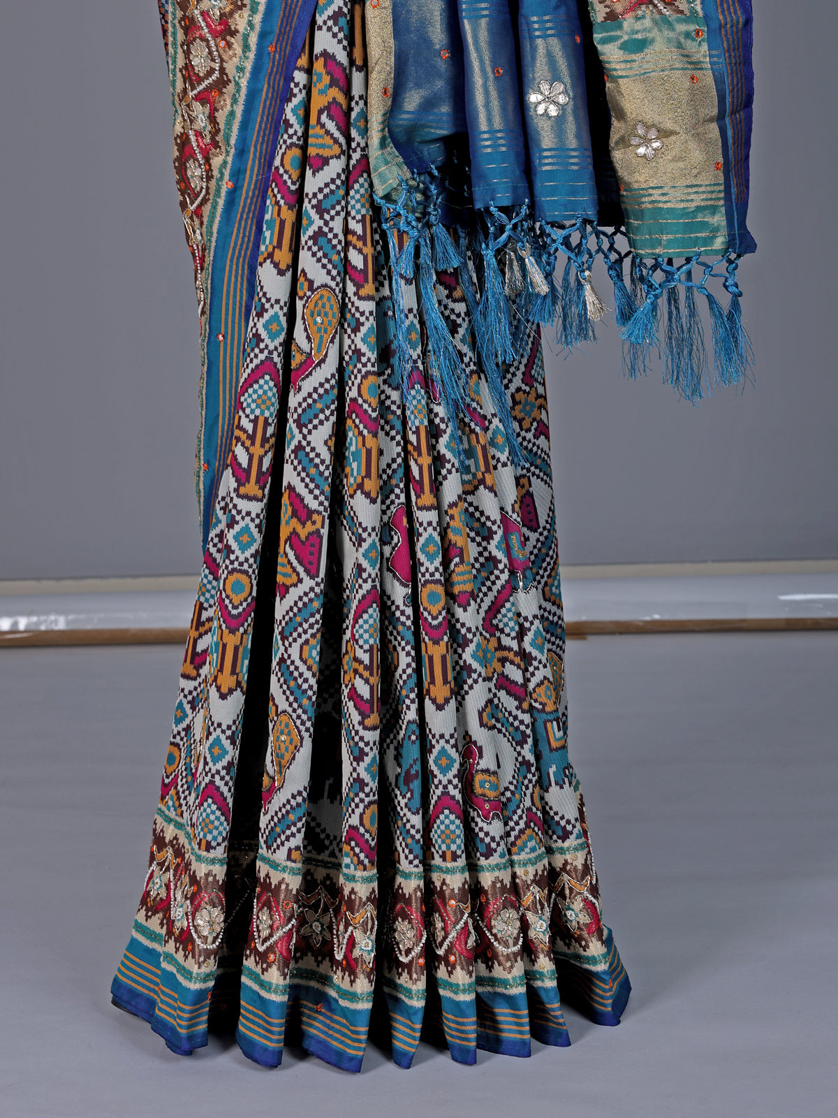 Blue semi patola silk saree with rich embellishments