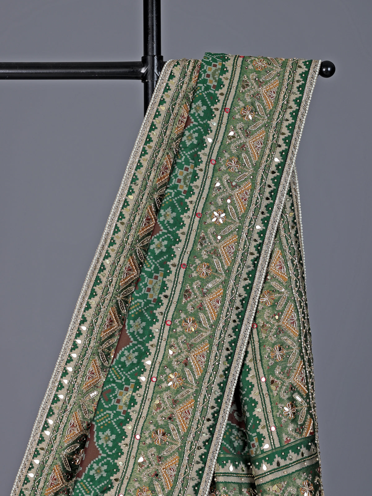 Green art patola silk saree with elephant motif design