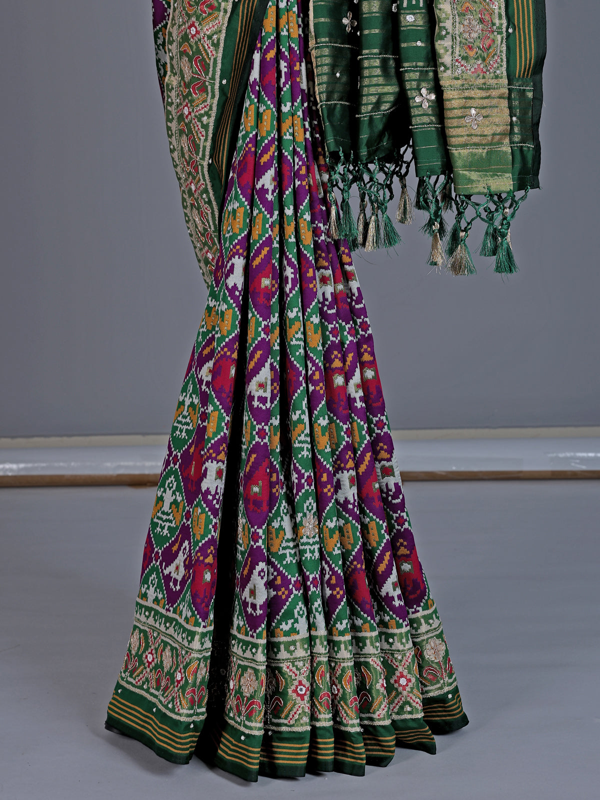 Purple and green art patola silk saree with motif design