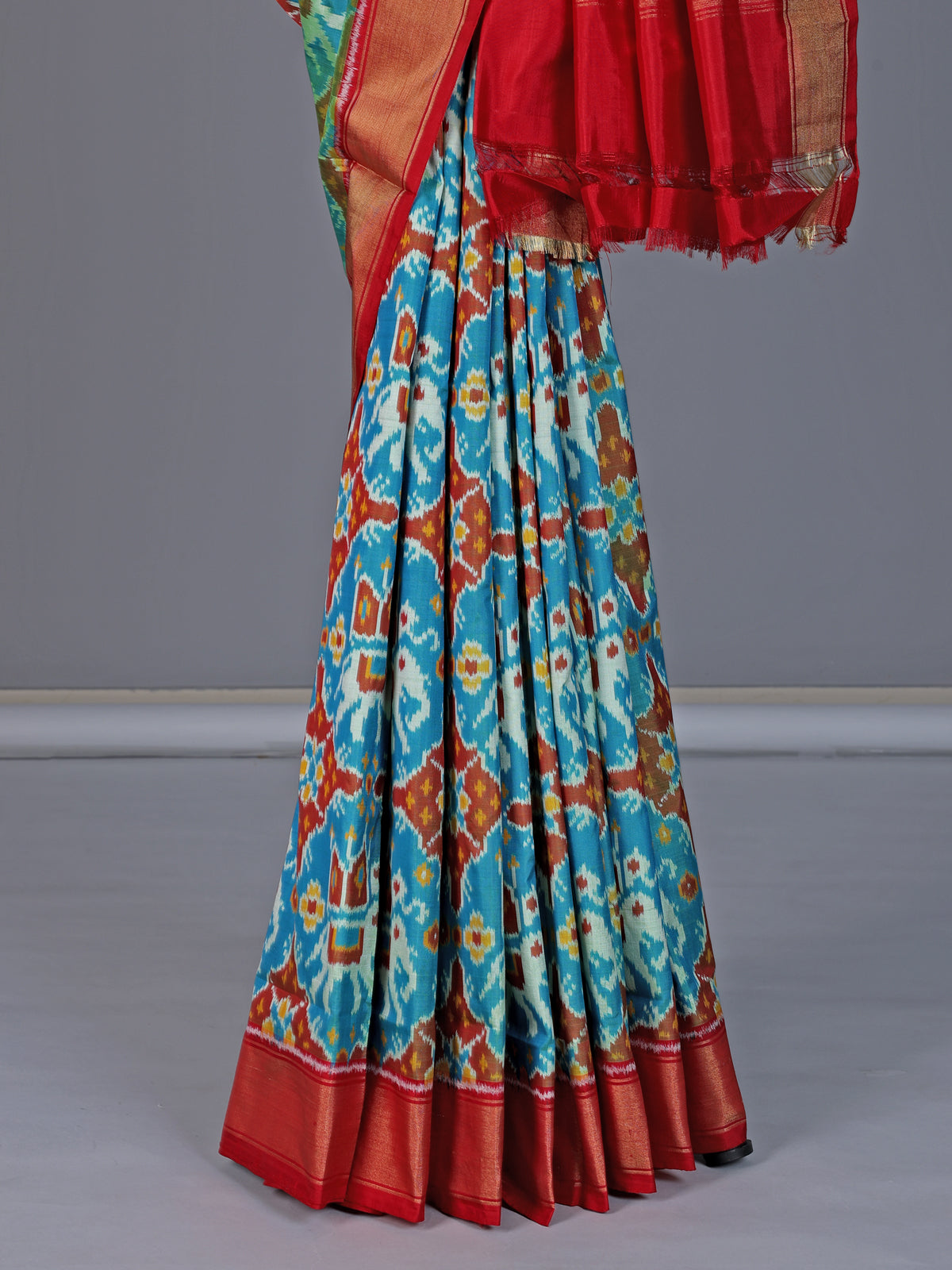 Sky blue patola silk saree with zari border