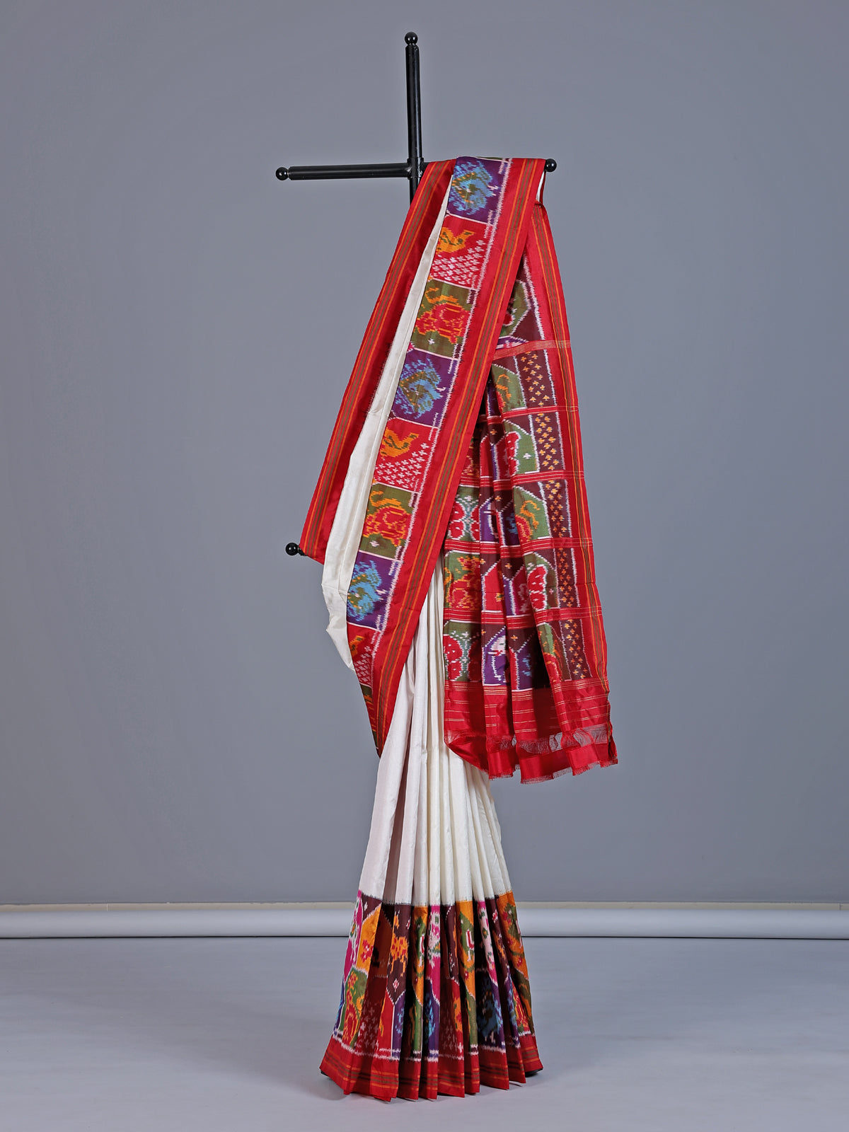 White pure patola silk saree with elephant bird motifs