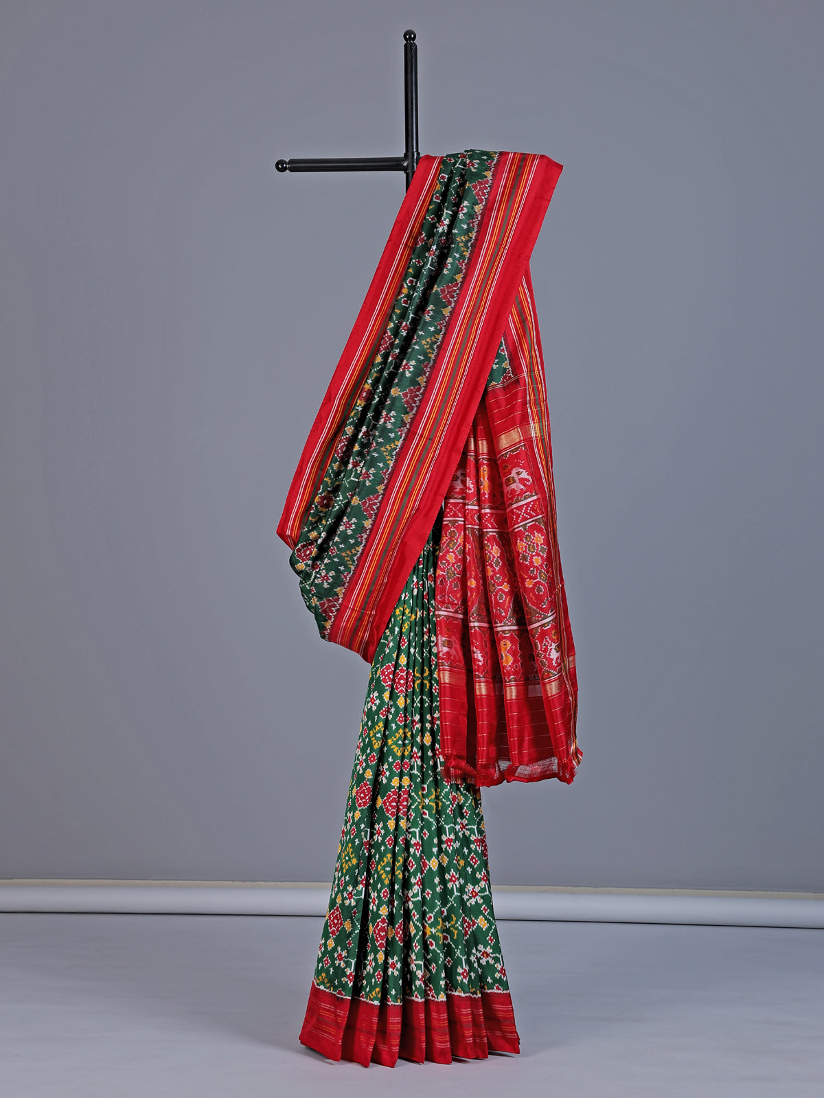 Green pure hyderabadi patola silk saree with elephant bird motif pallu