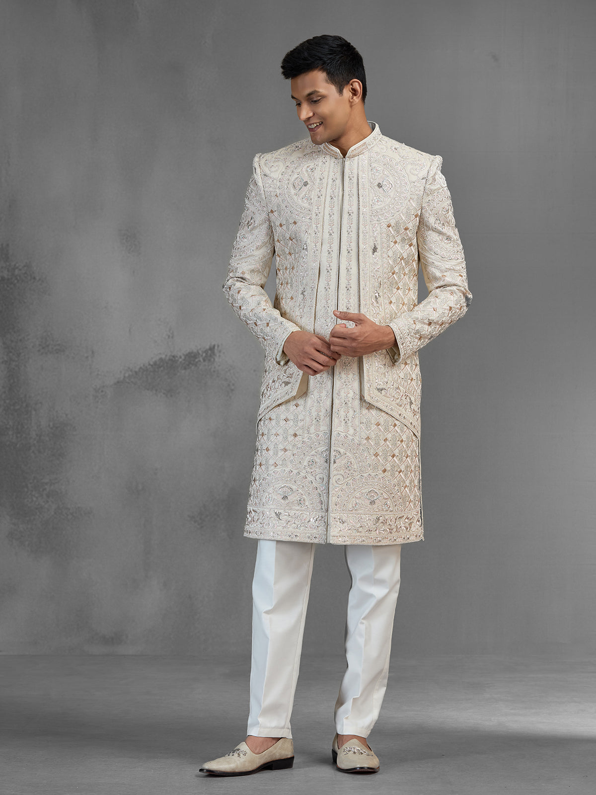 Beige silk open front sherwani with rich embroidery