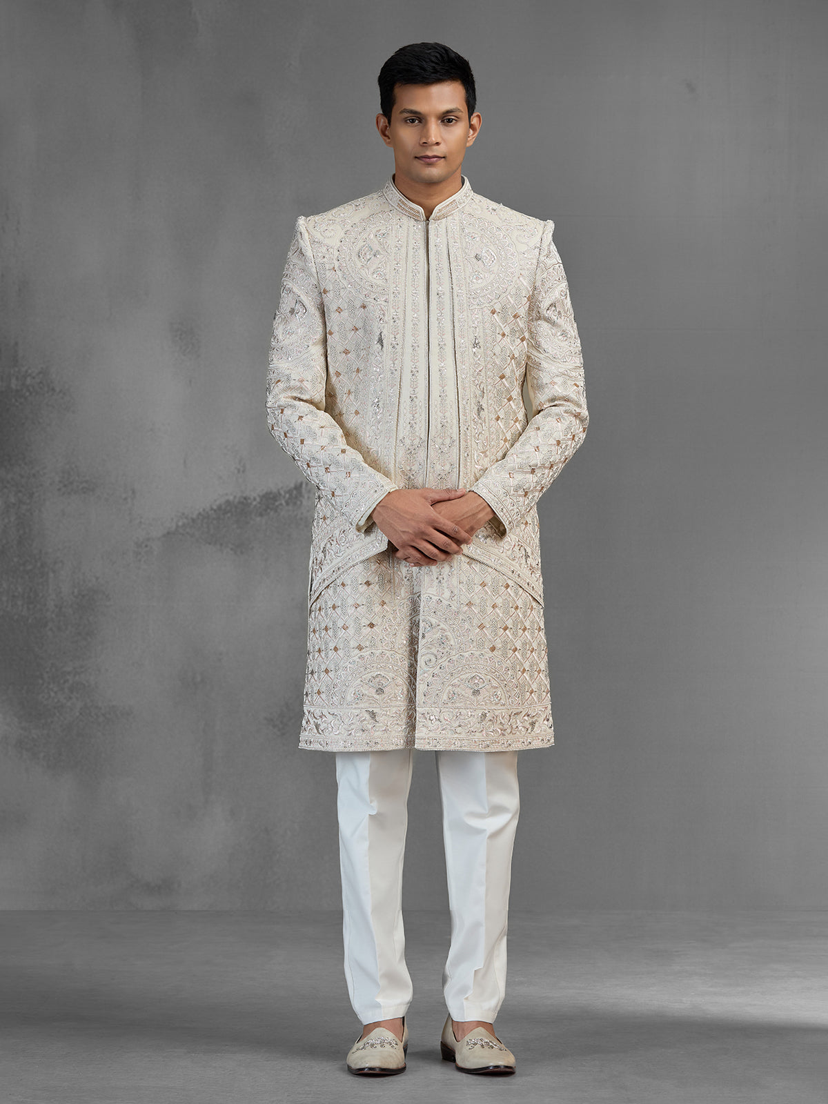 Beige silk open front sherwani with rich embroidery
