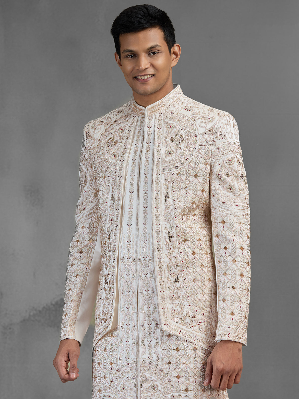 Cream silk open front sherwani with elegant detailing