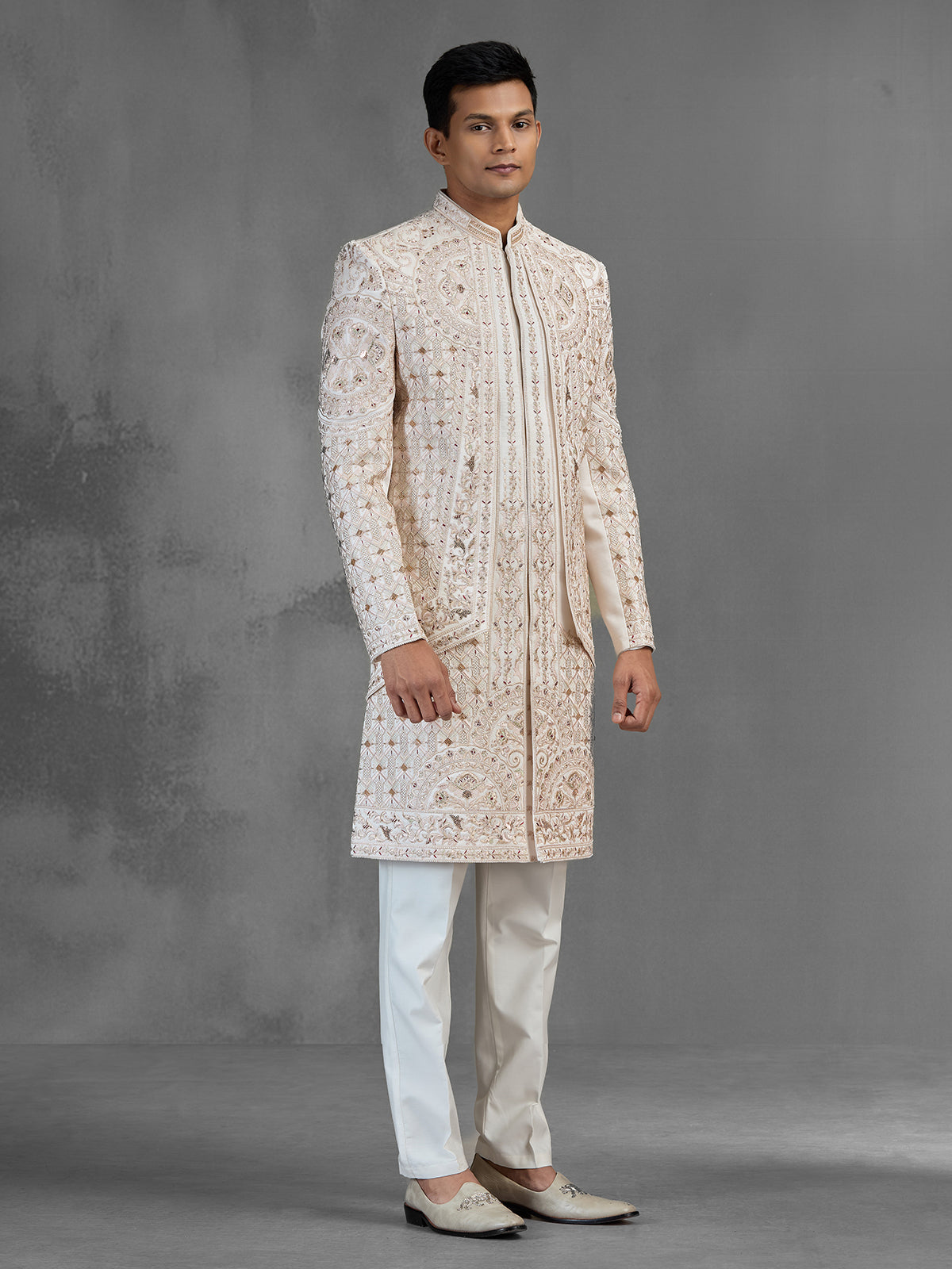 Cream silk open front sherwani with elegant detailing