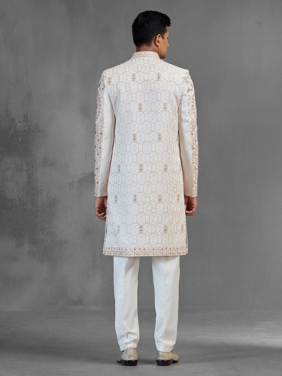 Cream silk open front sherwani with elegant detailing