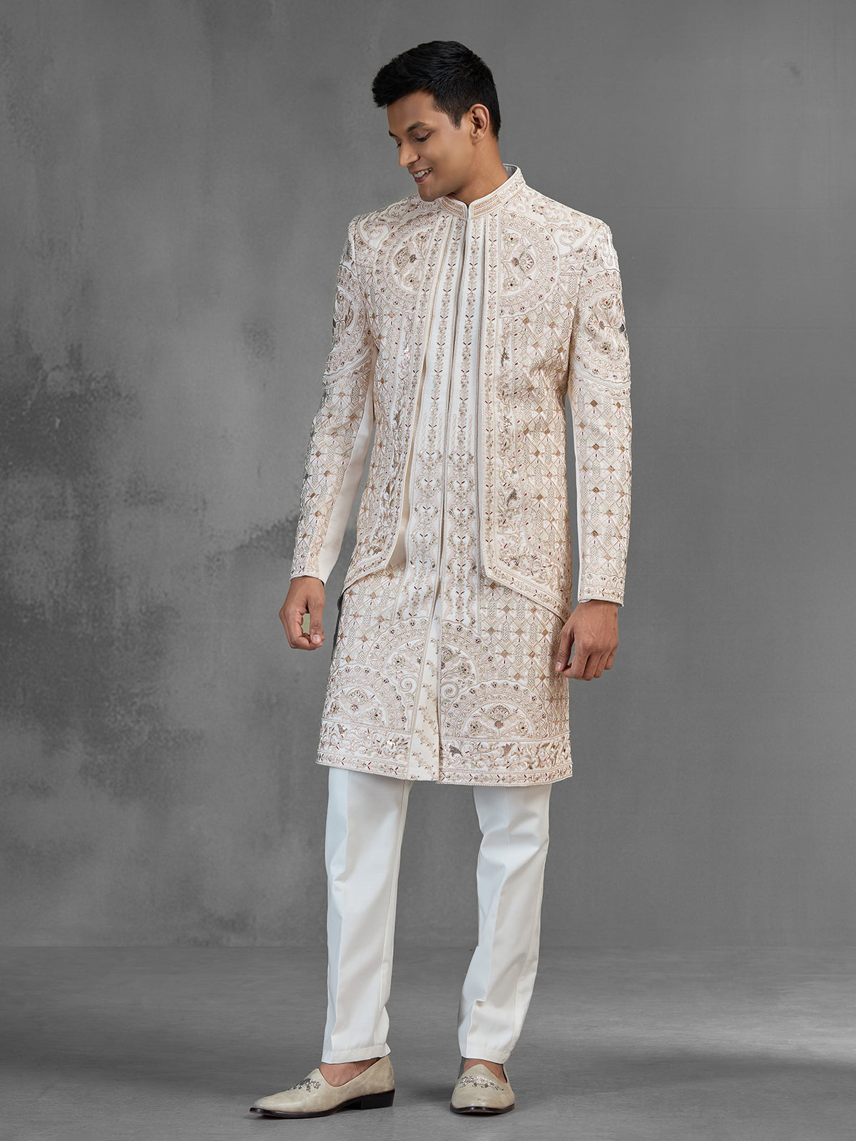 Cream silk open front sherwani with elegant detailing
