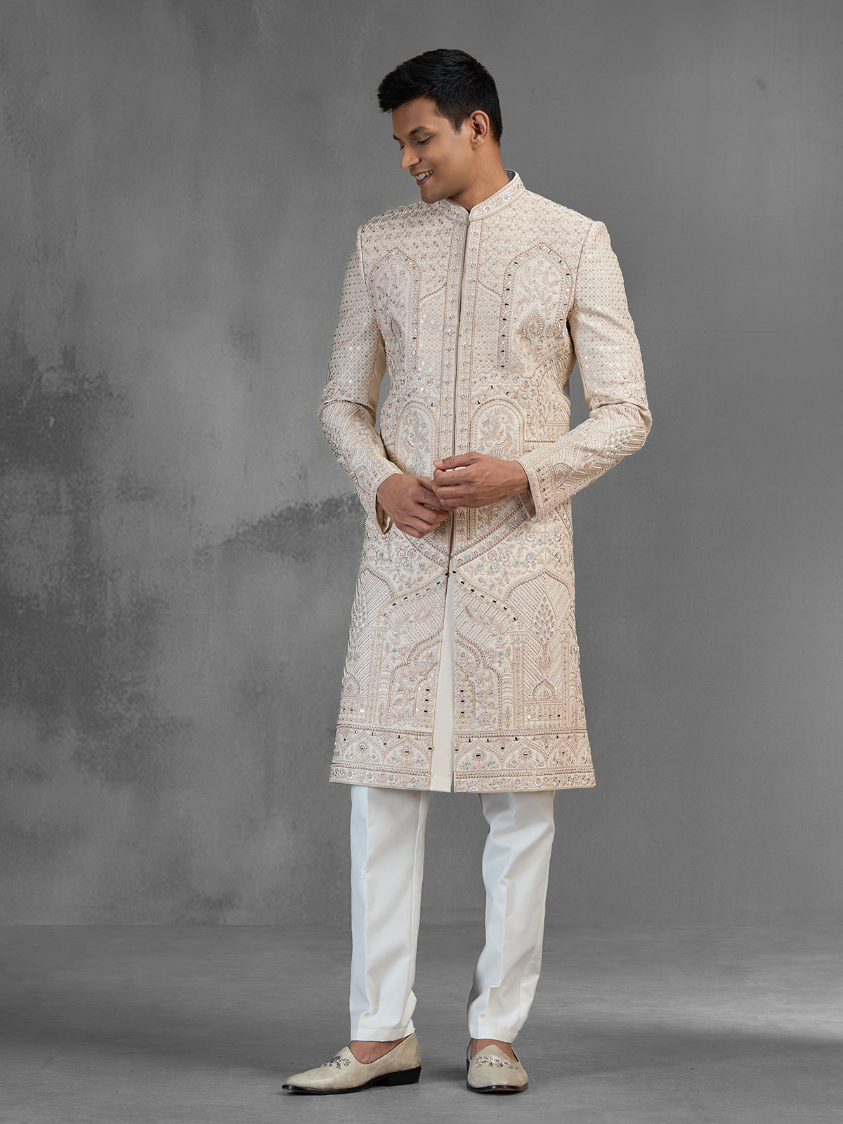 Rose gold raw silk sherwani with dense embroidery