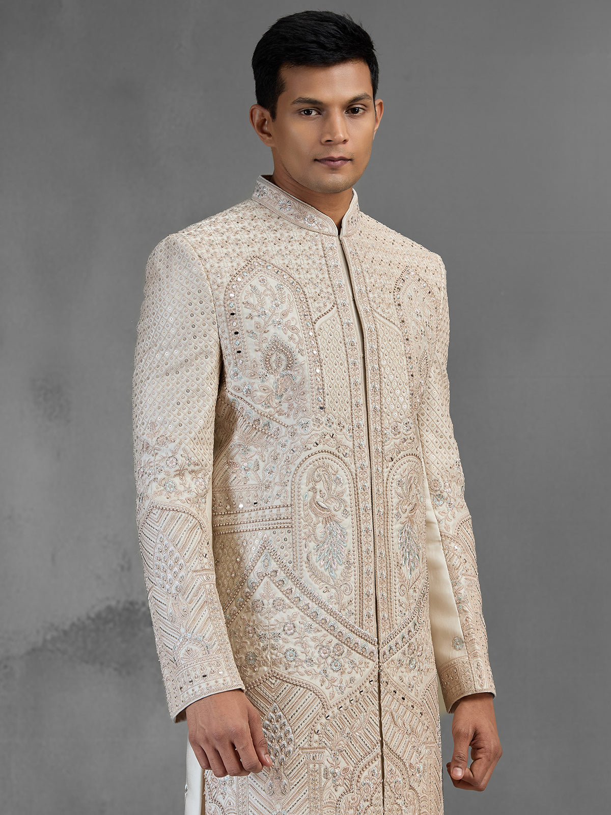 Cream gold raw silk sherwani with sequined peacocks