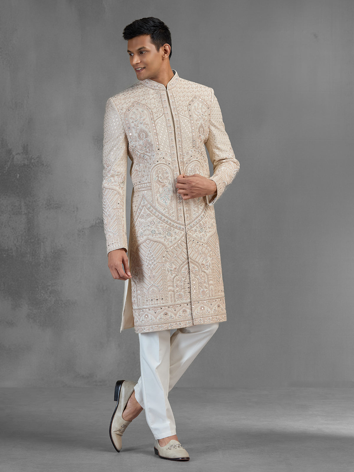 Cream gold raw silk sherwani with sequined peacocks