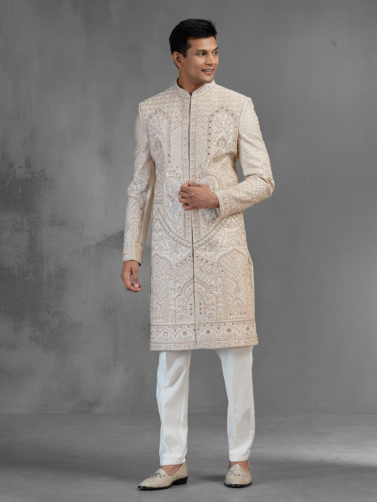 Cream gold raw silk sherwani with sequined peacocks