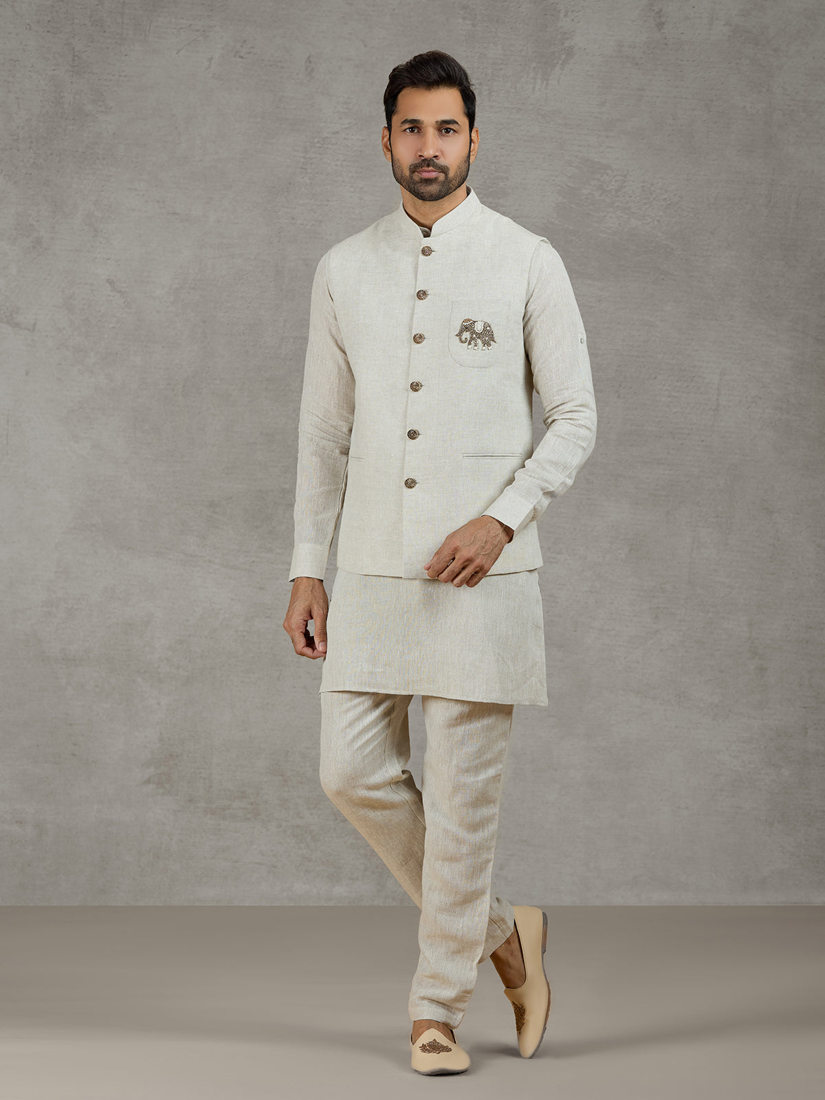 Beige linen waistcoat set with zari elephant embroidery