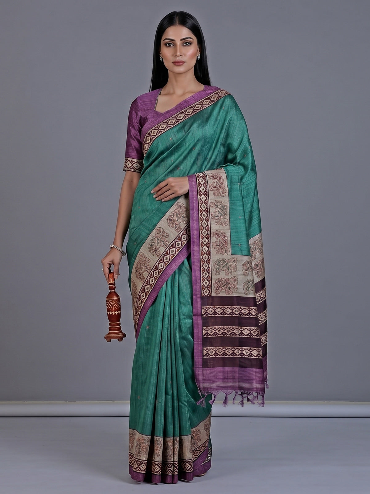Peacock green cotton silk saree with elephant motifs