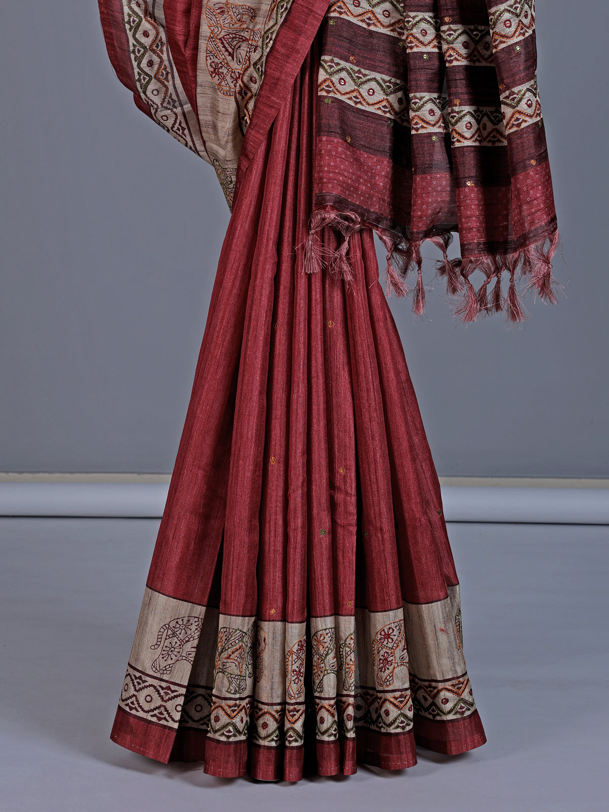 Maroon cotton silk saree with elephant motifs