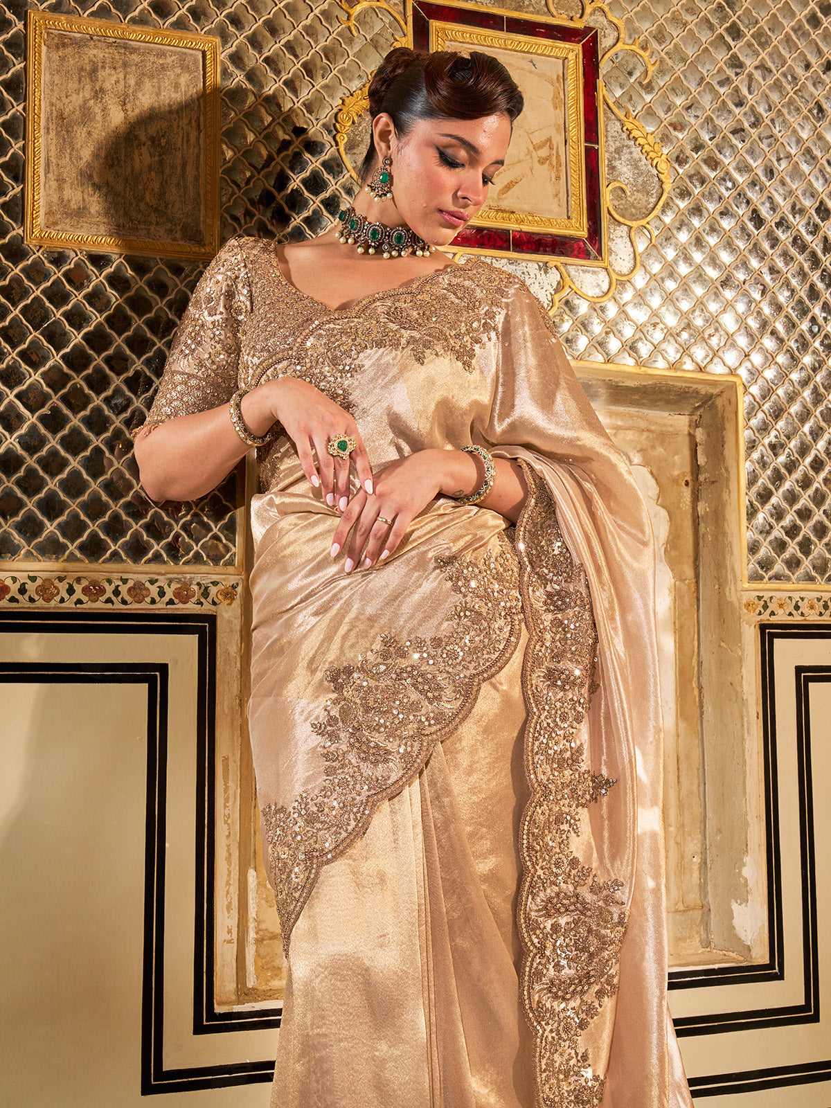 Gold shimmer tissue silk saree with subtle textured drape