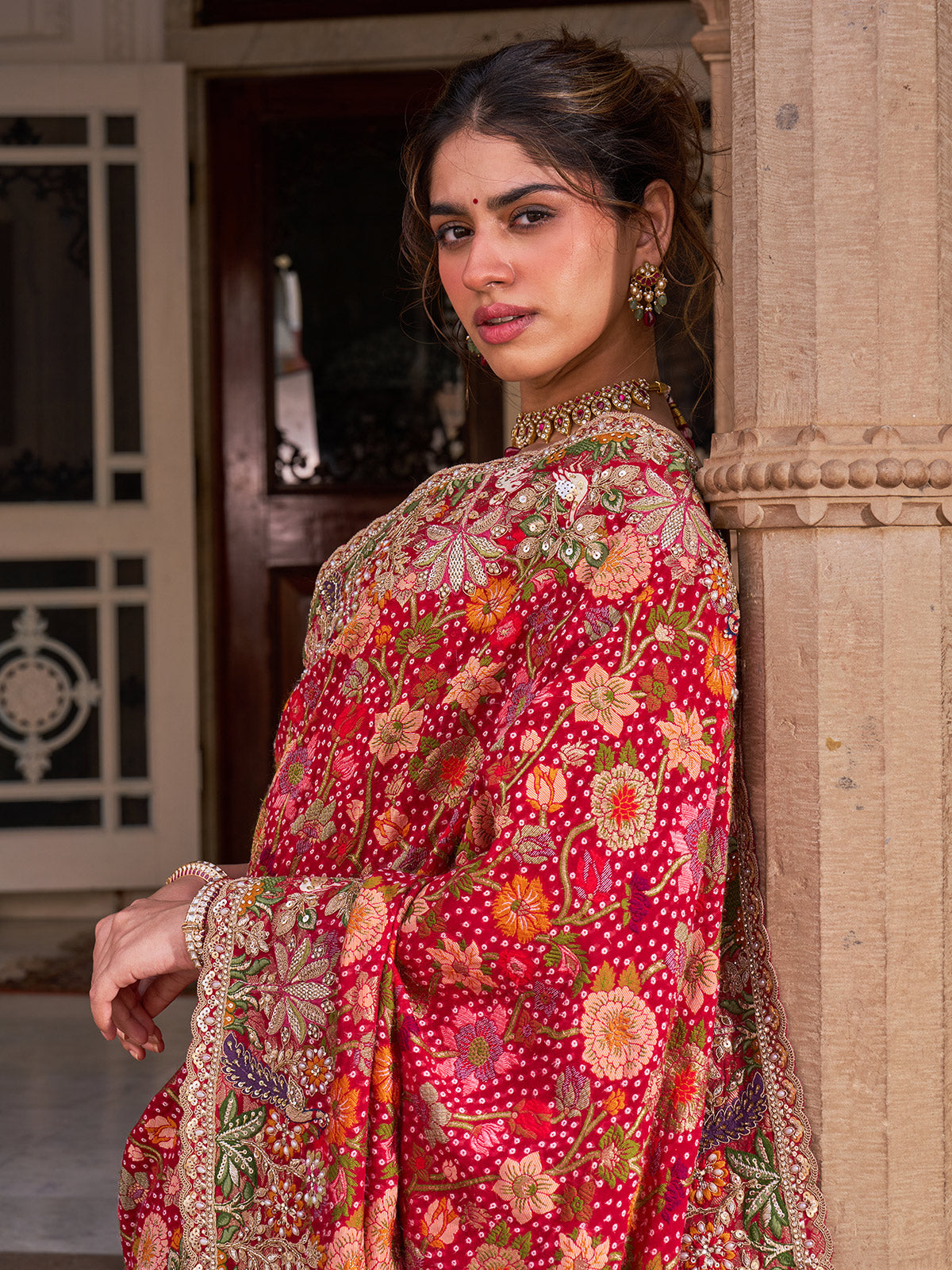 Fuchsia pink georgette saree with multicolor resham embroidery