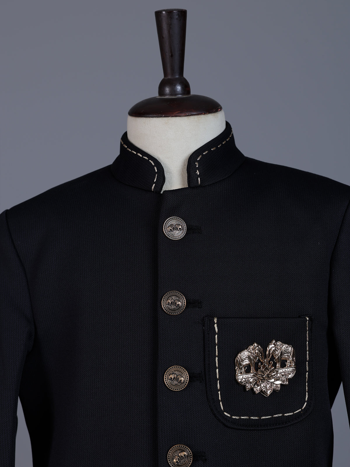 Black polyester viscose jodhpuri suit with brooch