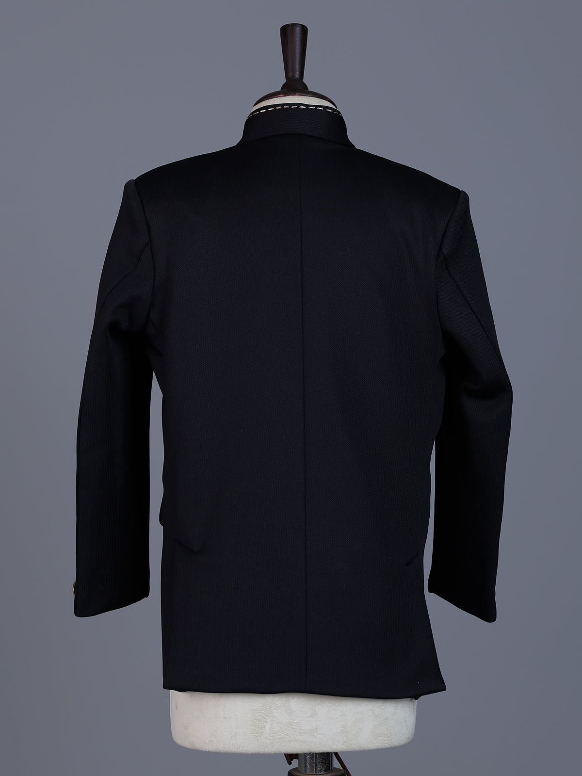Black polyester viscose jodhpuri suit with brooch