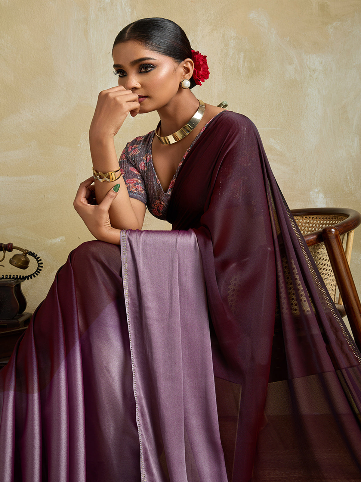 Wine shaded velvet chiffon saree with stone work