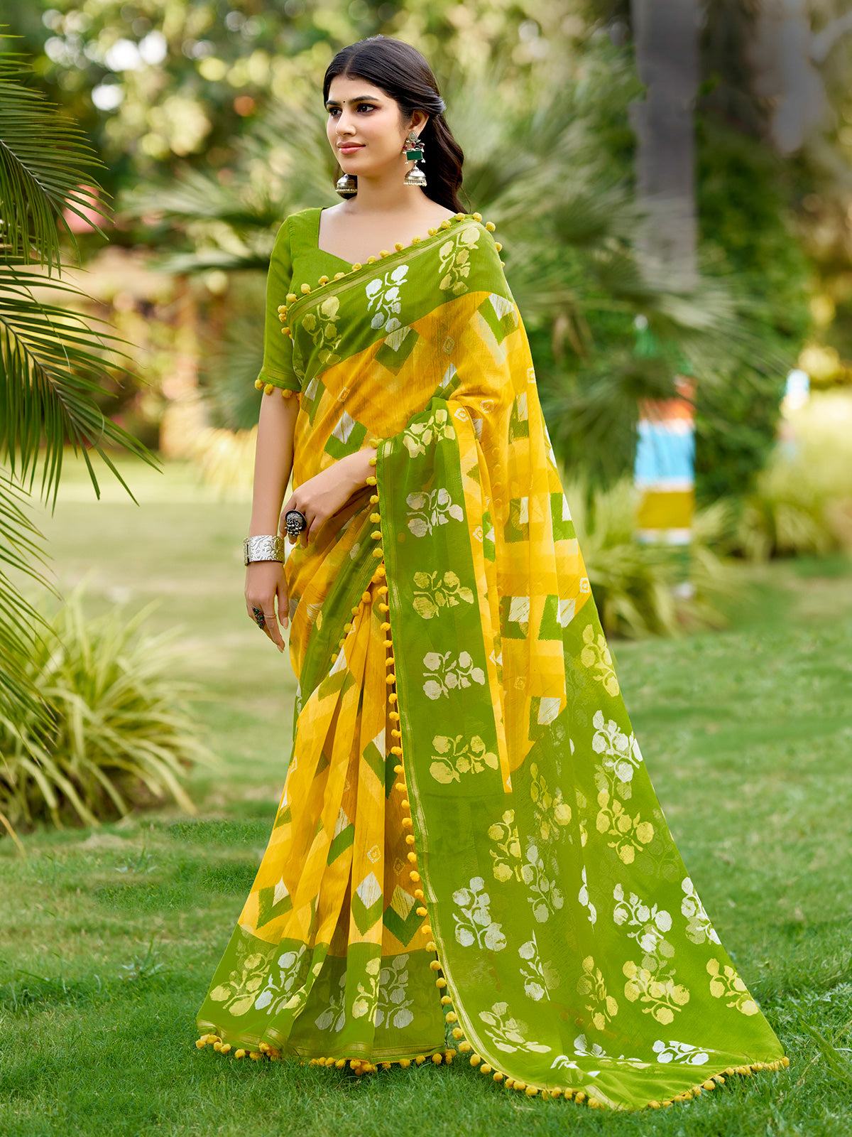 Mustard yellow malmal cotton saree with pum pum accents
