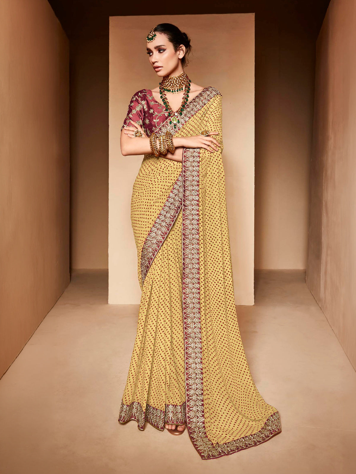 Yellow georgette bandhej saree with sequin detailing