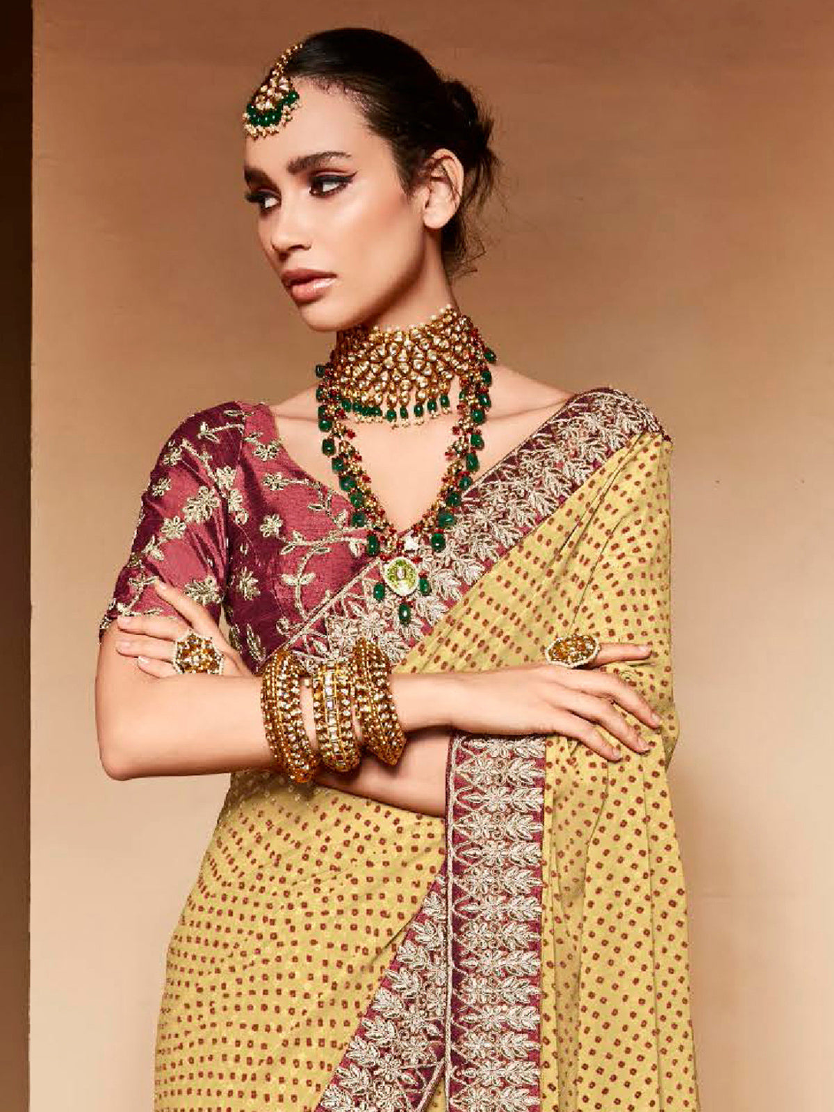 Yellow georgette bandhej saree with sequin detailing