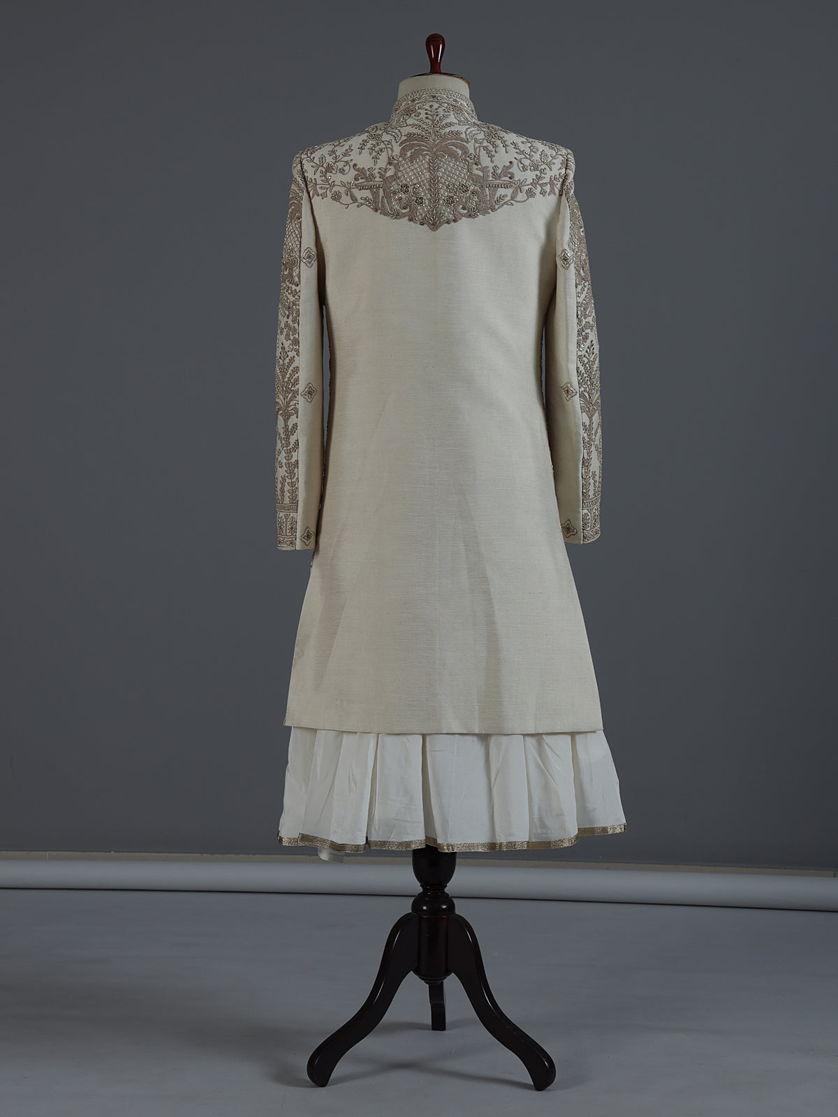 Cream raw silk sherwani with regal zardosi and sequins work