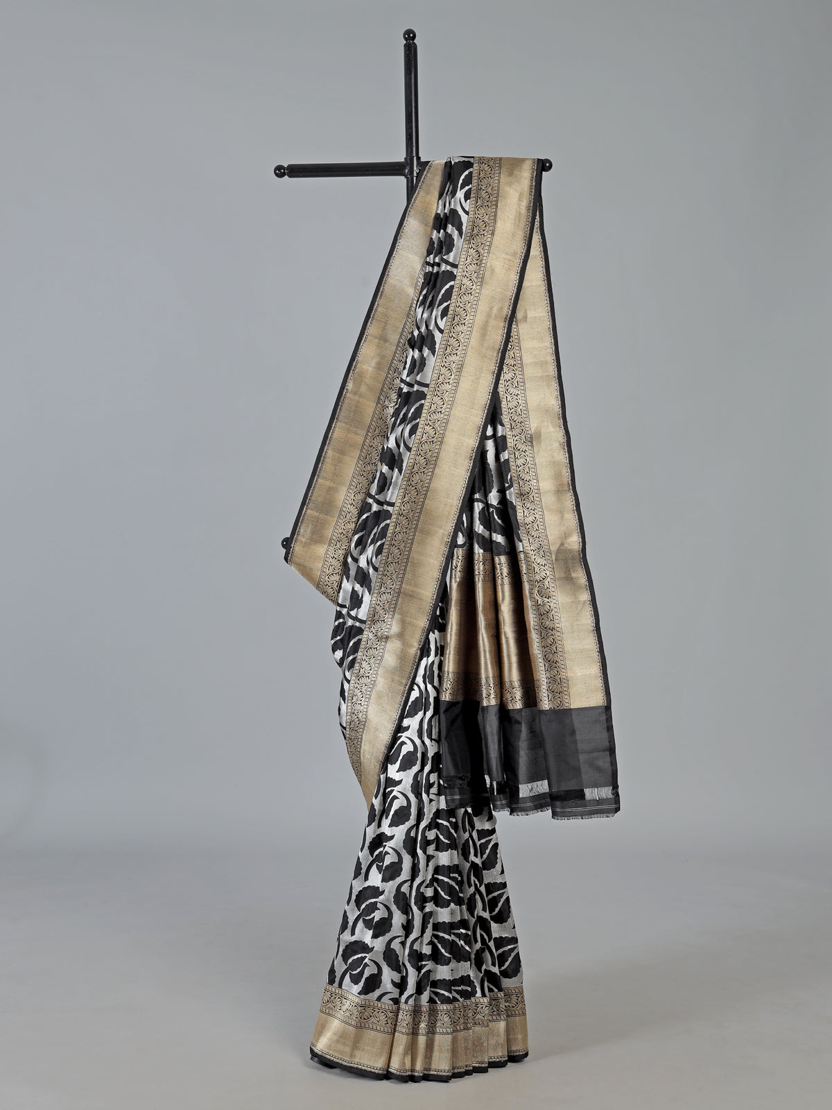 Black banarasi silk saree adorned with elegant silver zari detailing