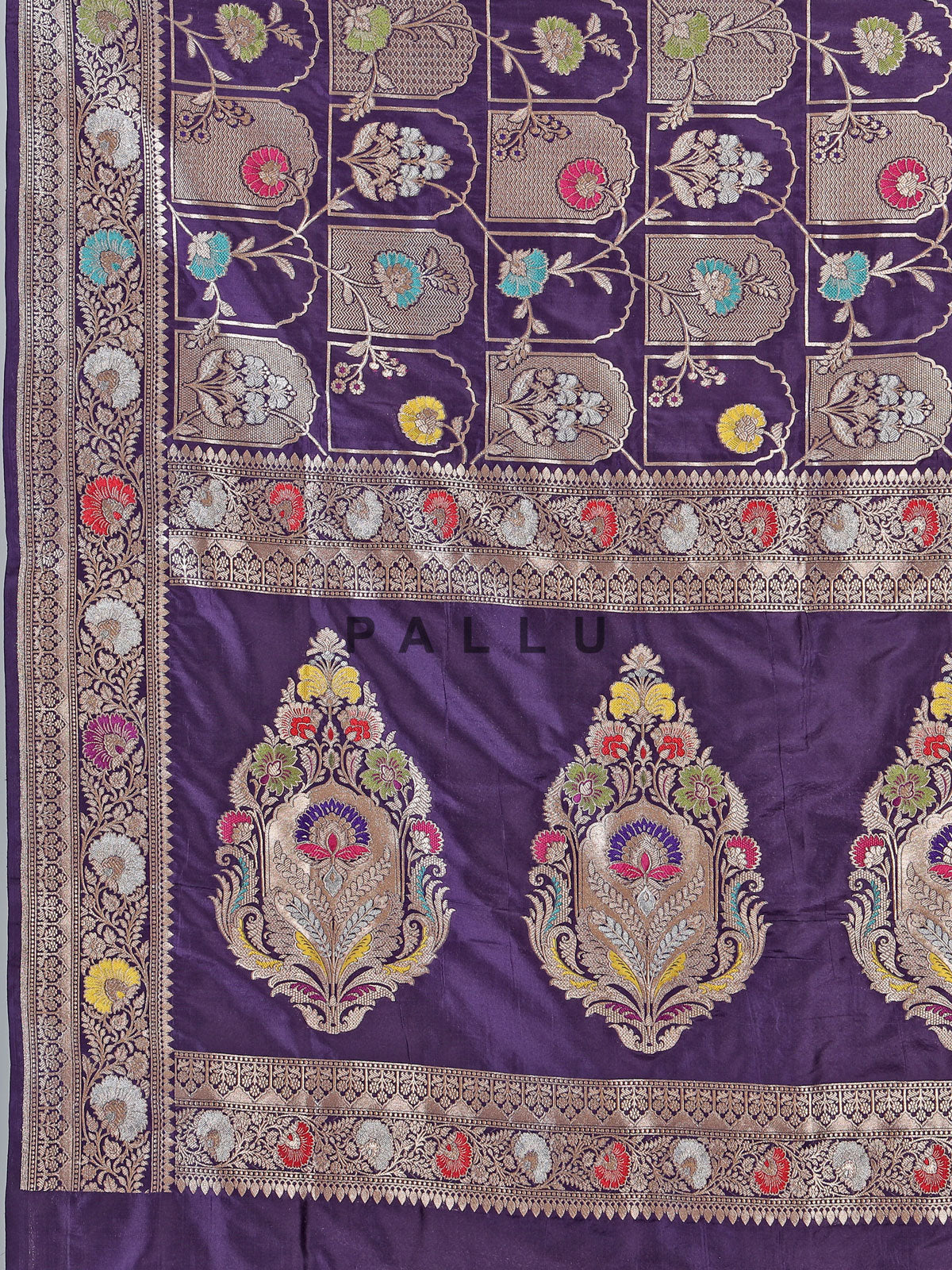 Purple banarasi silk saree featuring detailed zari work for weddings