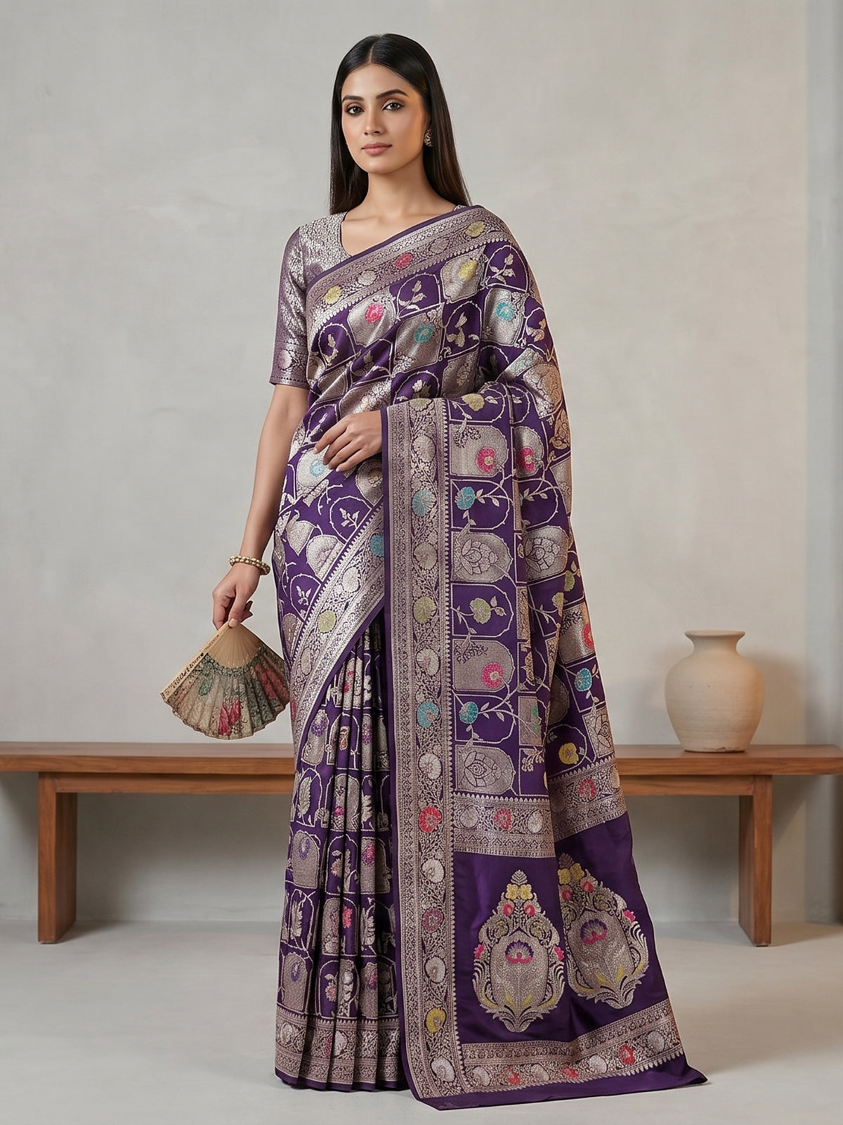 Purple banarasi silk saree featuring detailed zari work for weddings