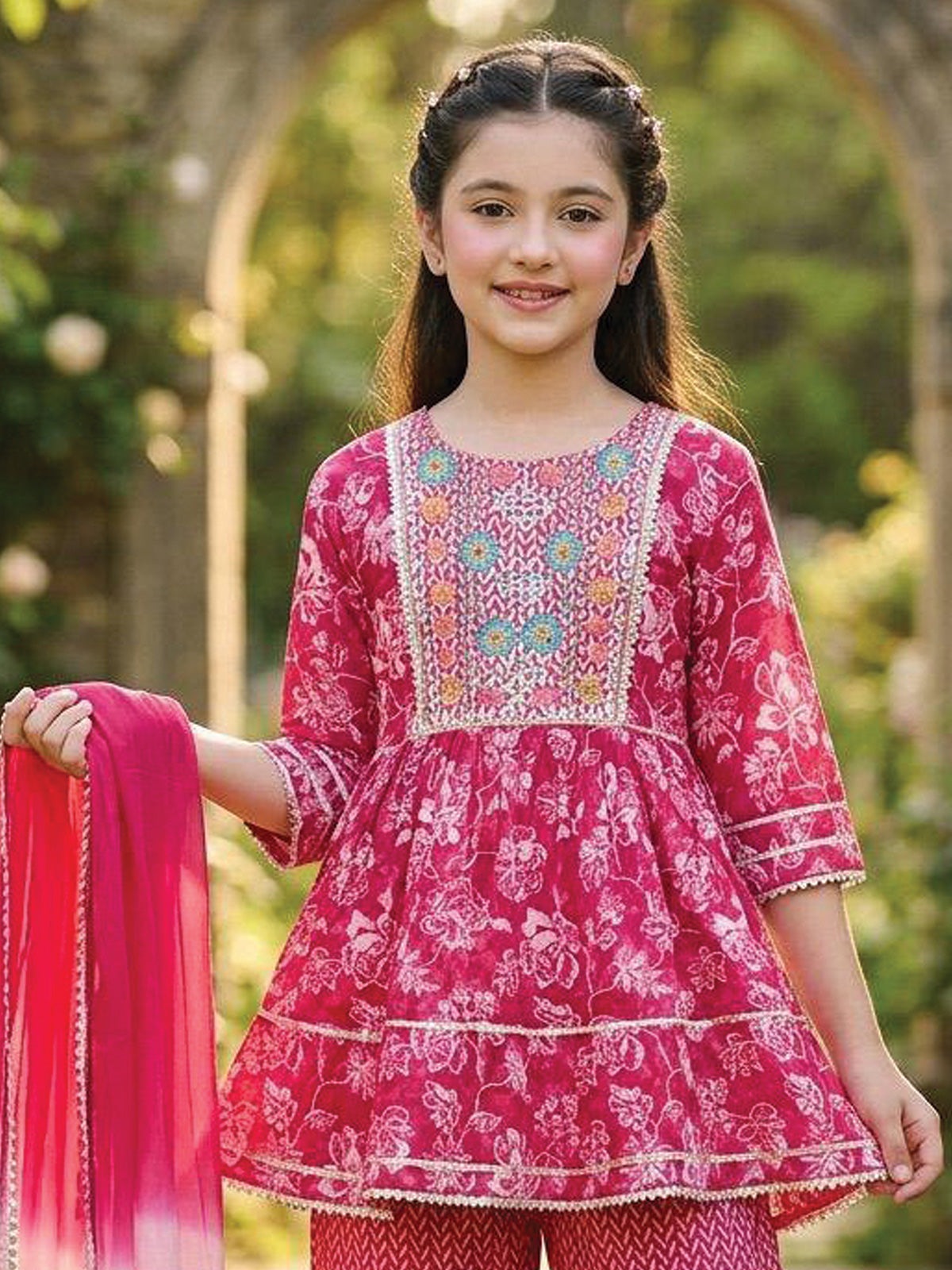 Rani pink cotton sharara suit with floral prints