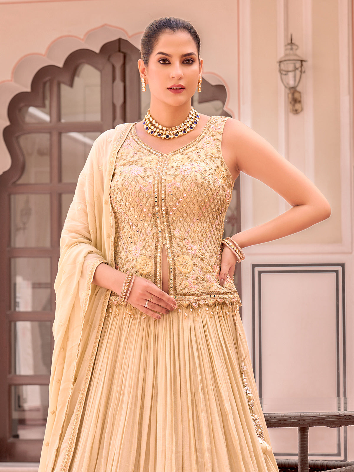 Cream silk lehenga choli with floral print detailing