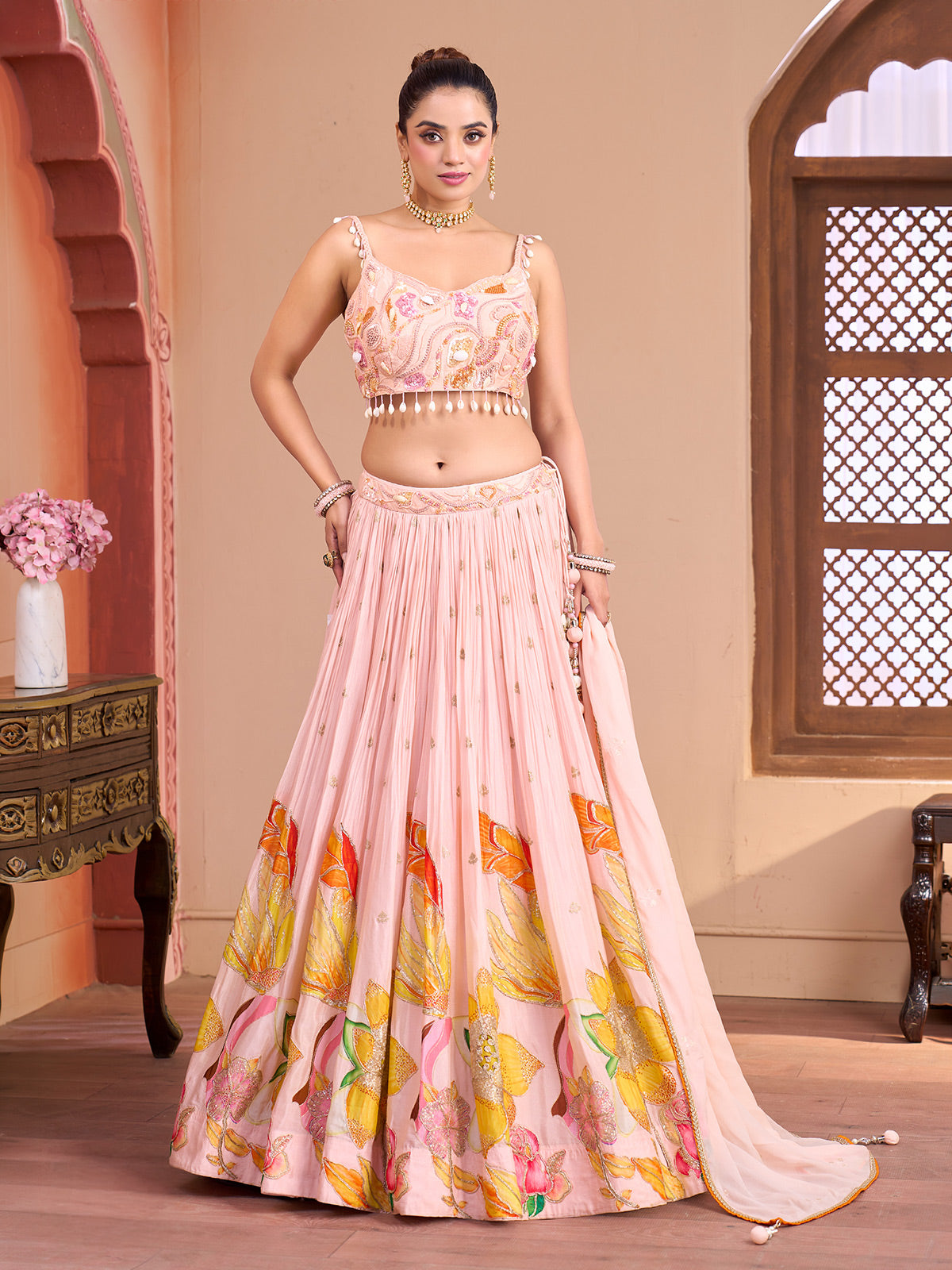 Light pink silk lehenga choli with floral shell detailing