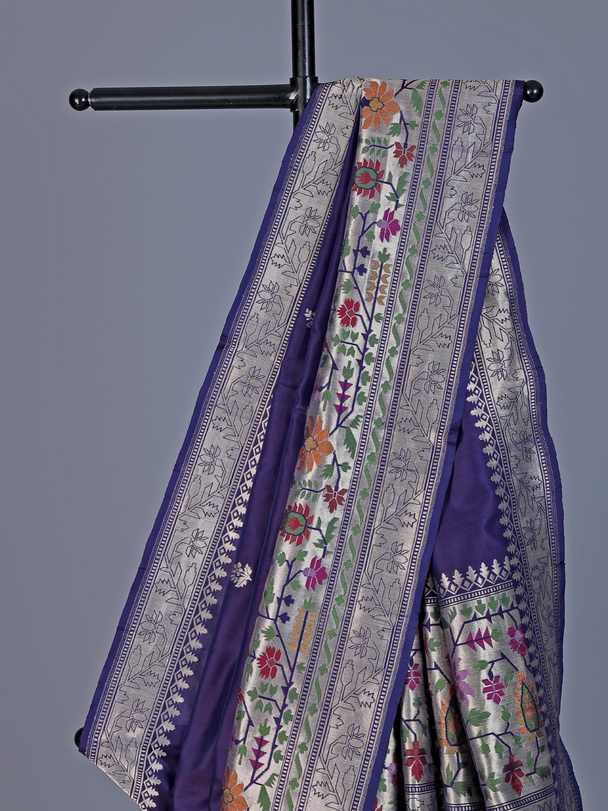 Purple banarasi silk saree with floral zari butti border