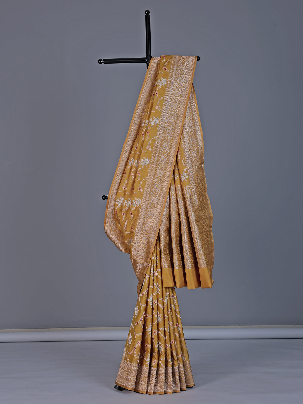 Dusty yellow banarasi silk saree with floral zari design