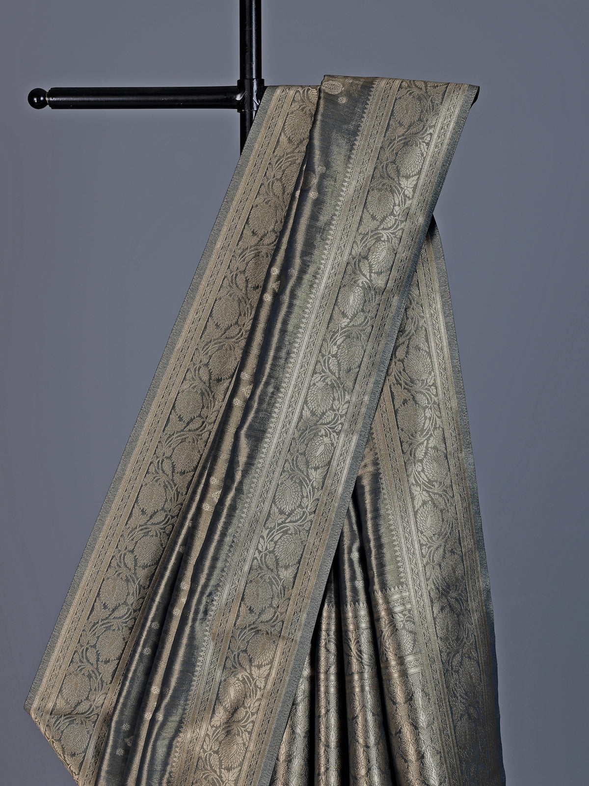 Grey tissue silk saree with refined butti and detailed pallu