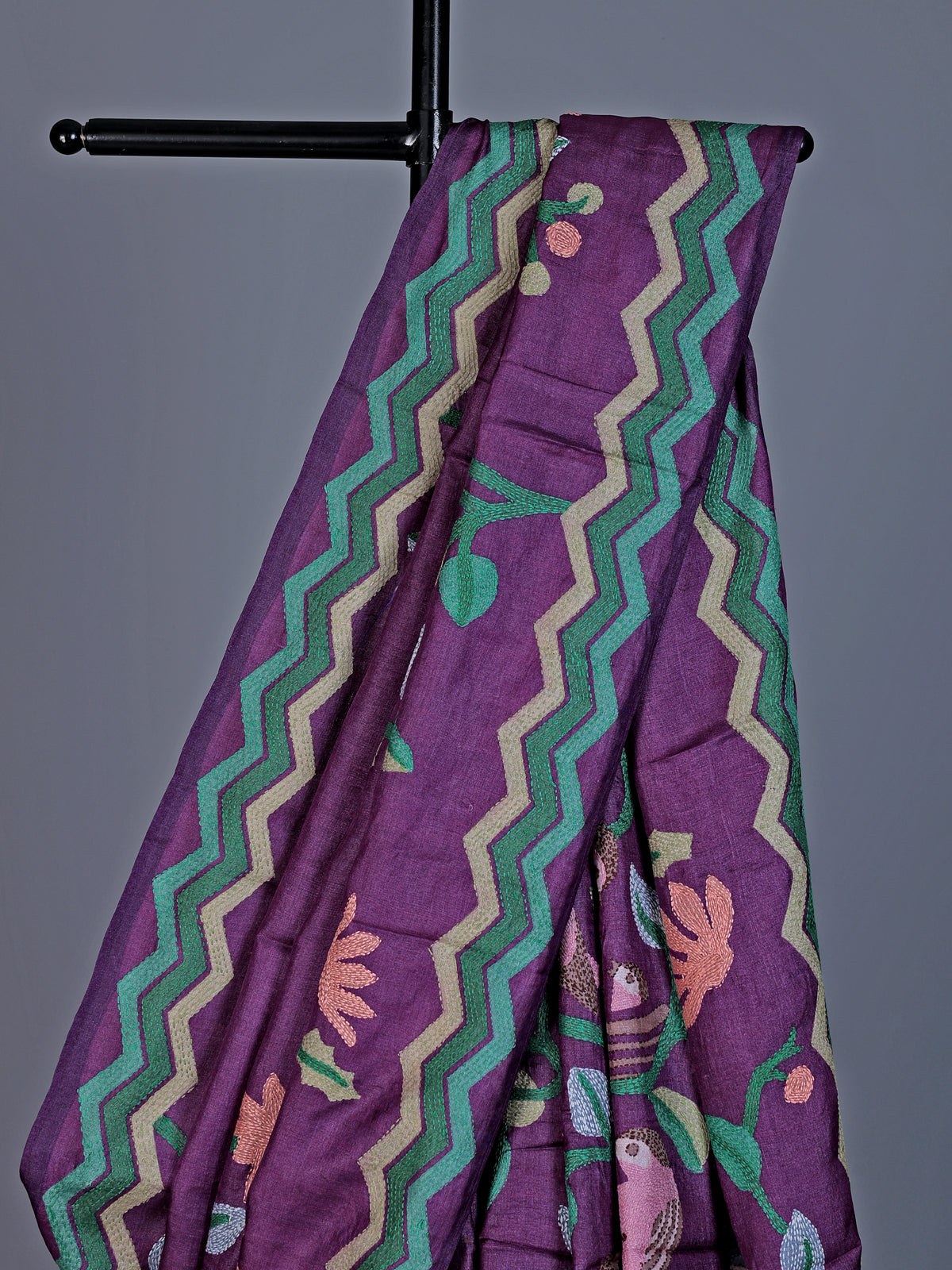 Purple tusser silk saree with graceful bird threadwork detailing