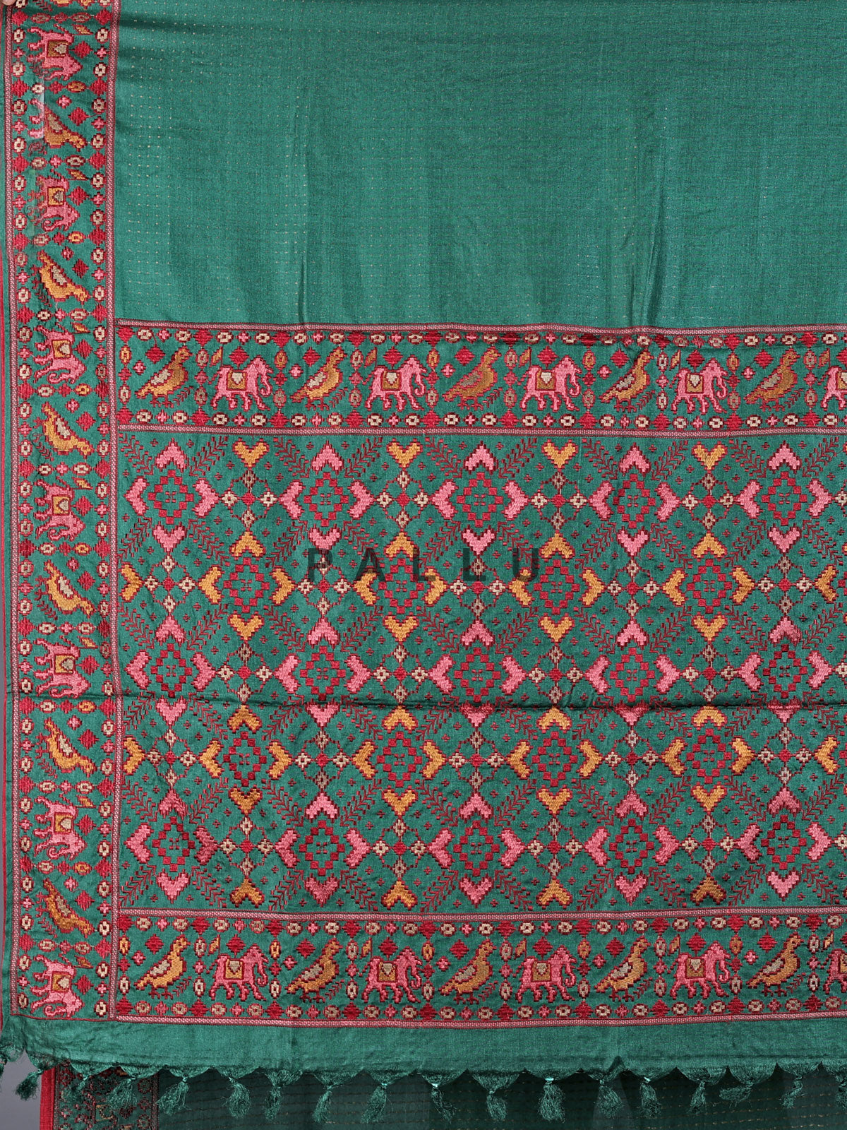 Deep green tusser silk saree with intricate animal motif artistry